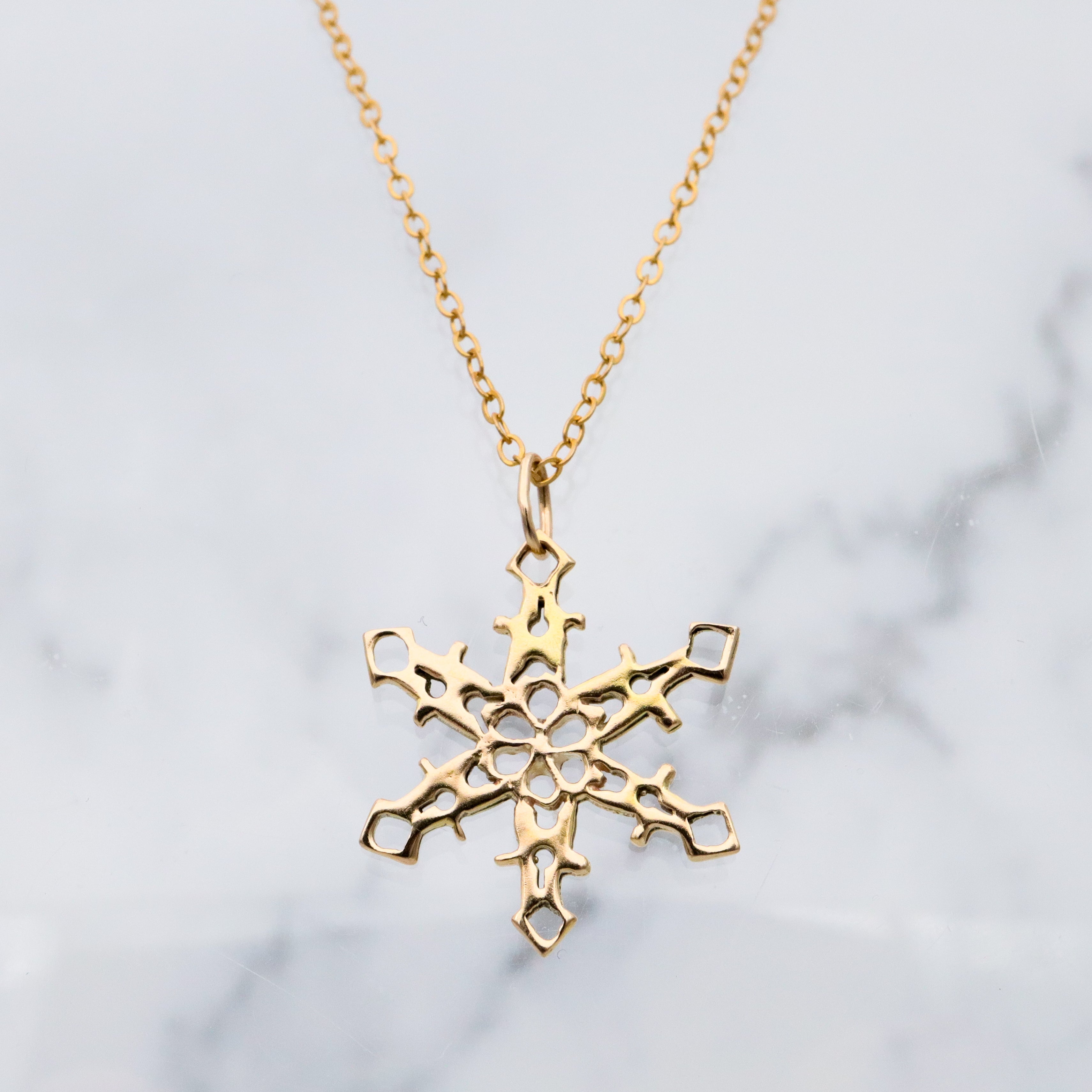 vintage 14k gold snowflake charm pendant