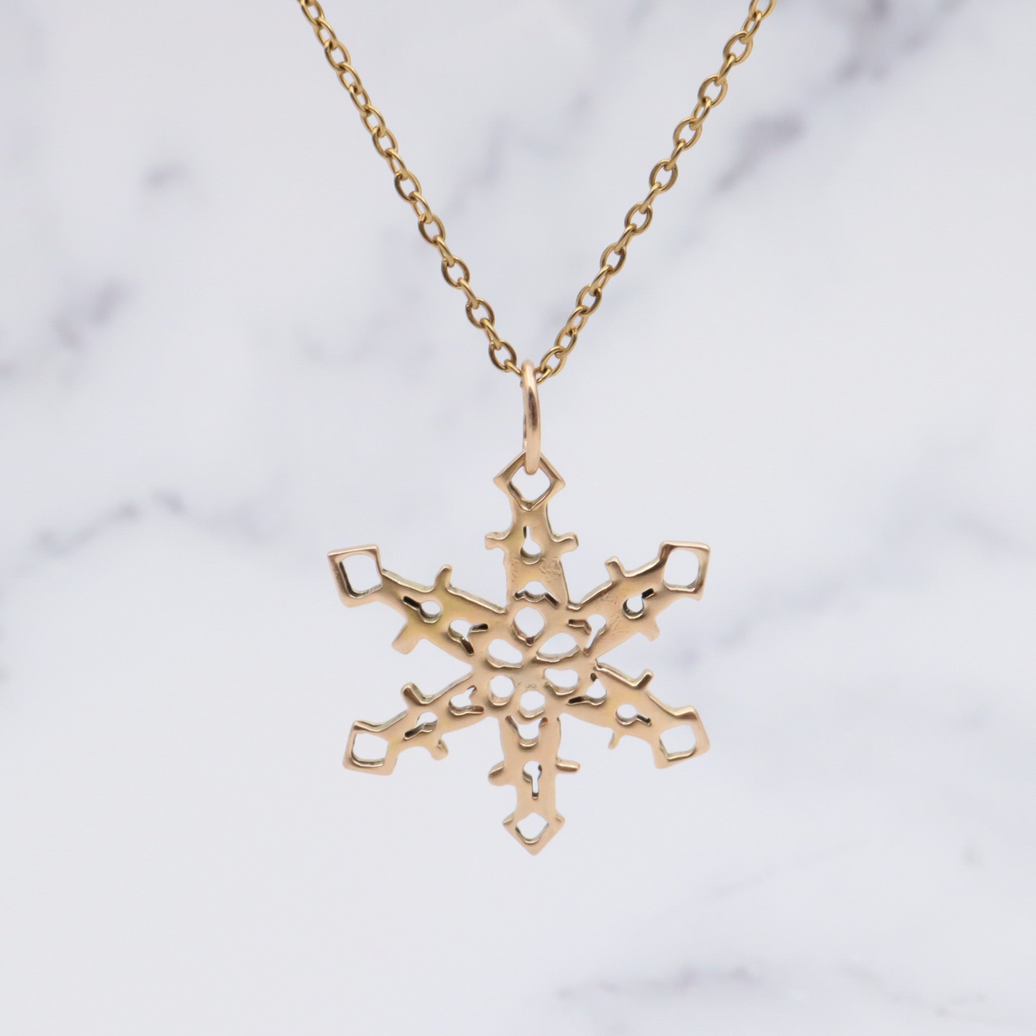 Vintage 14k gold handmade snowflake pendant