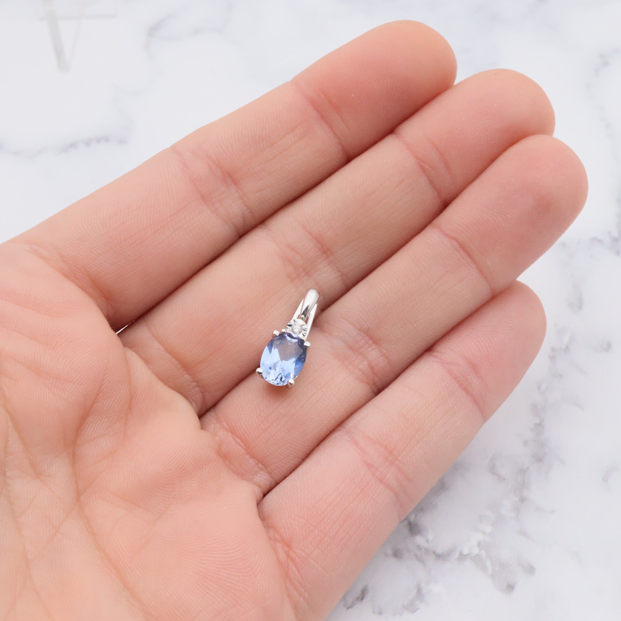 Vintage 10k gold diamond and simulated sapphire pendant