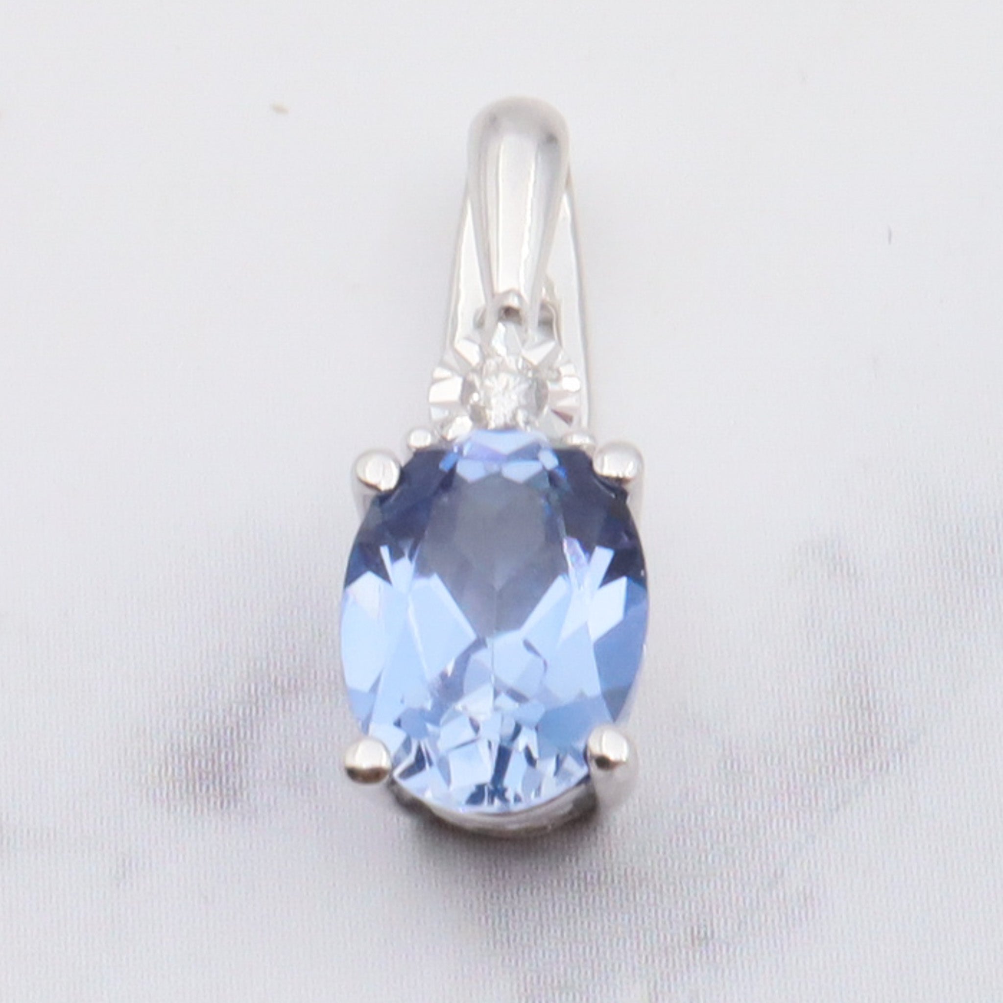 Vintage 10k gold diamond and simulated sapphire pendant