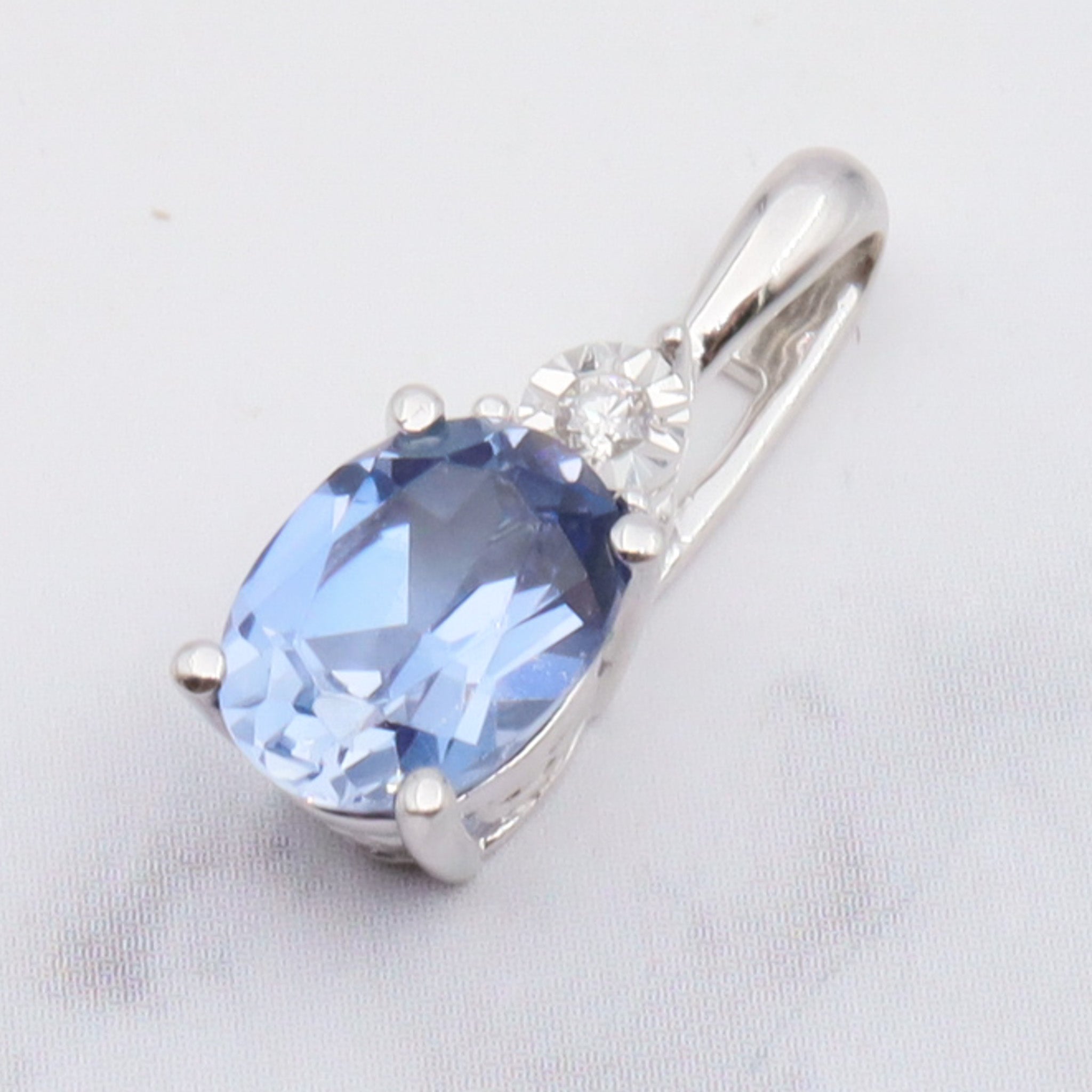 Vintage 10k gold diamond and simulated sapphire pendant