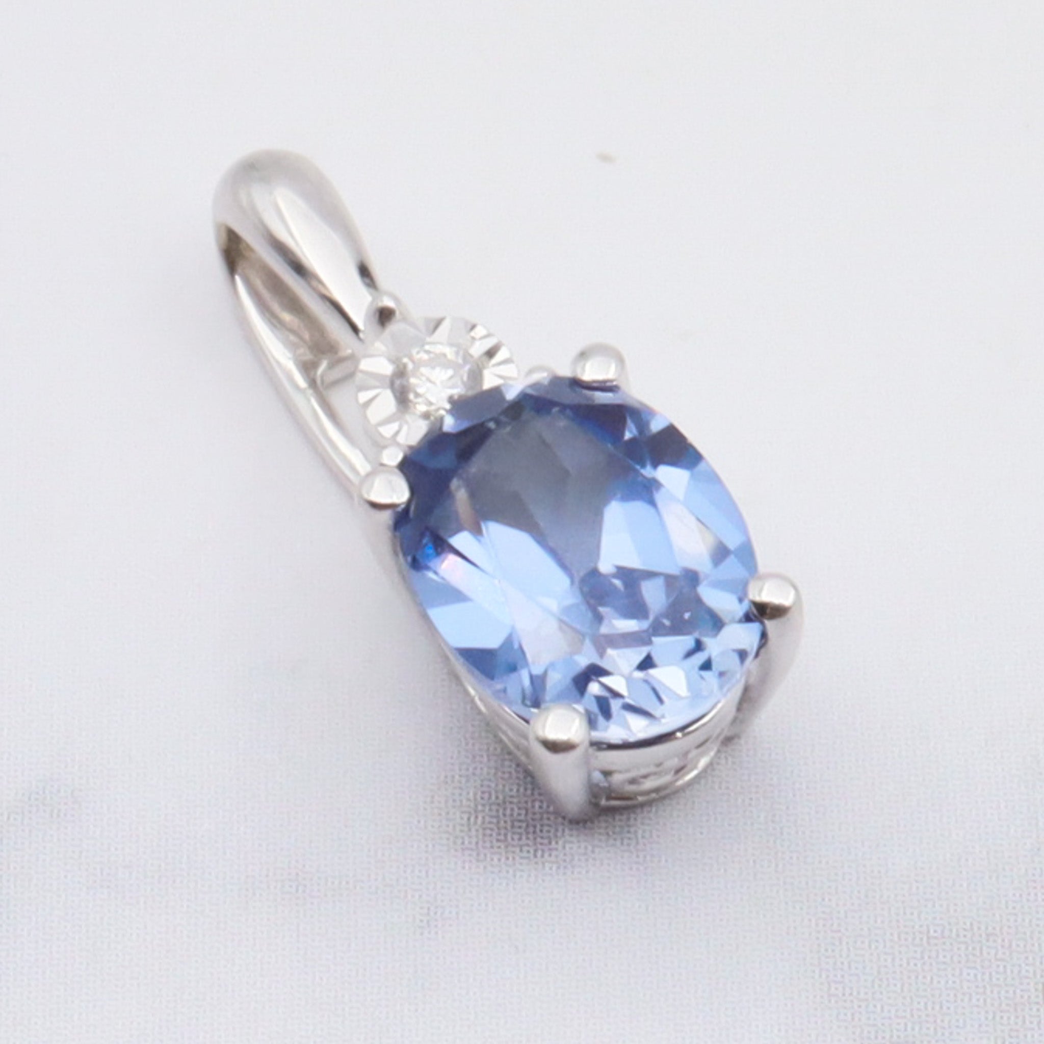 Vintage 10k gold diamond and simulated sapphire pendant