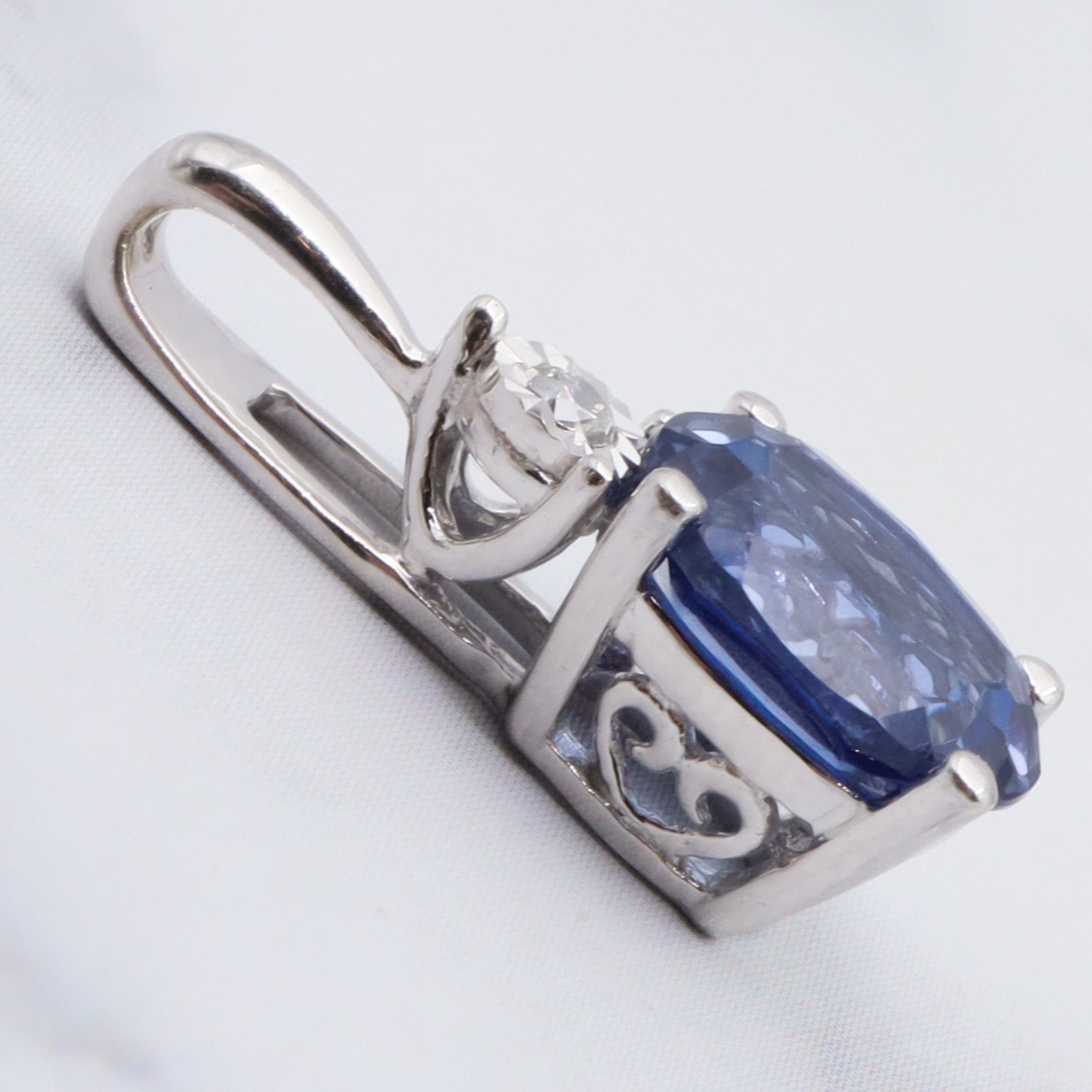 Vintage 10k gold diamond and simulated sapphire pendant