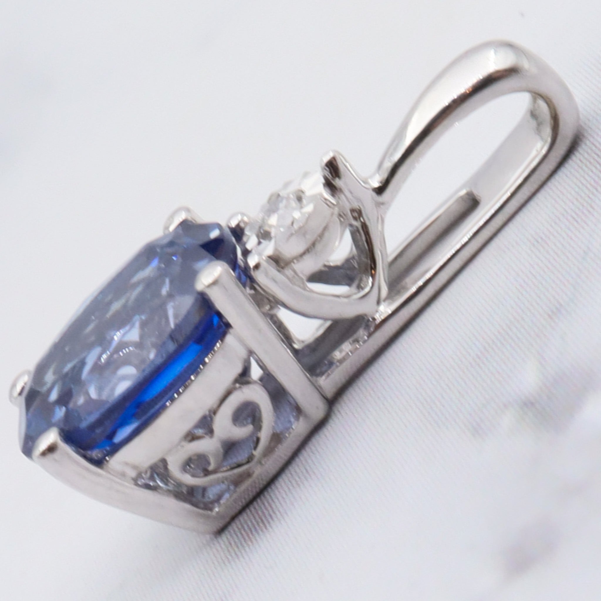 Vintage 10k gold diamond and simulated sapphire pendant