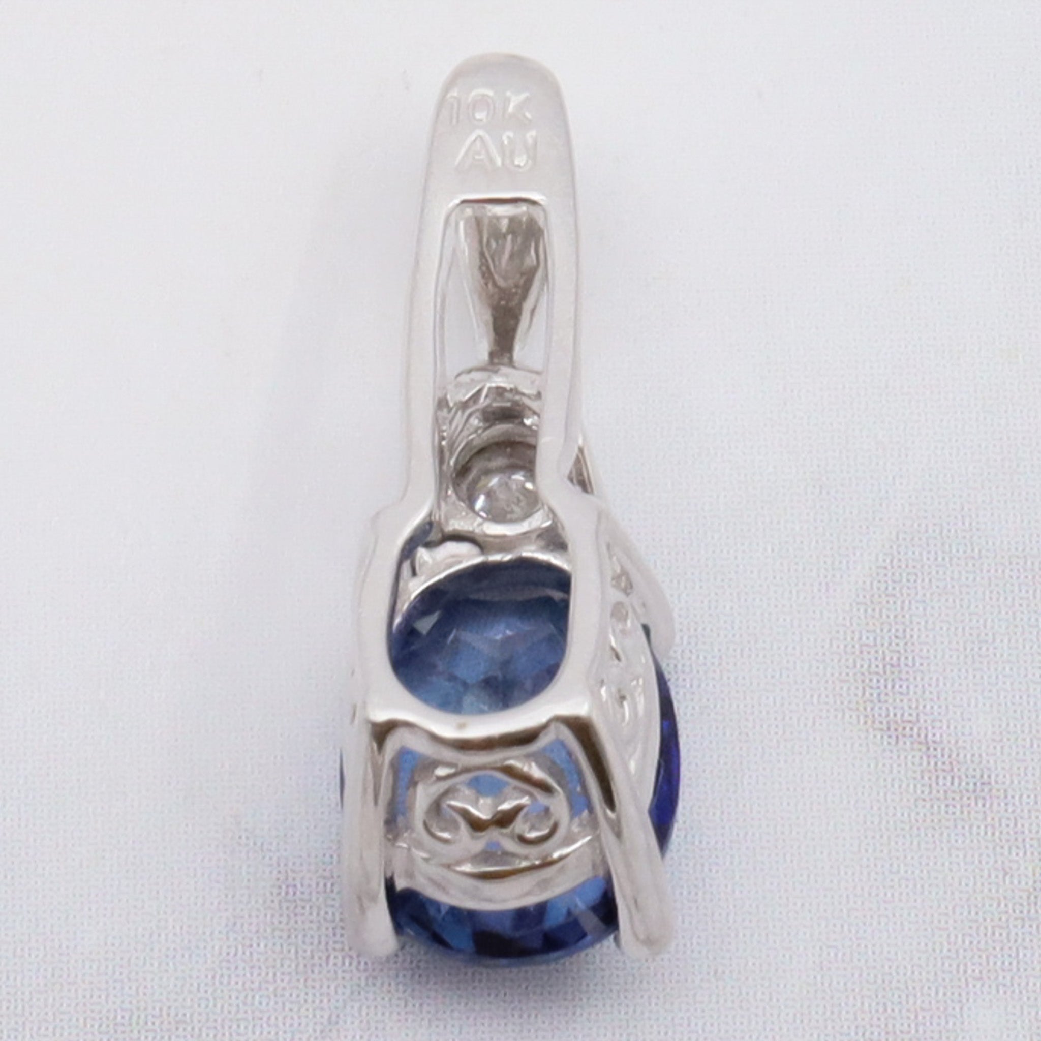 Vintage 10k gold diamond and simulated sapphire pendant