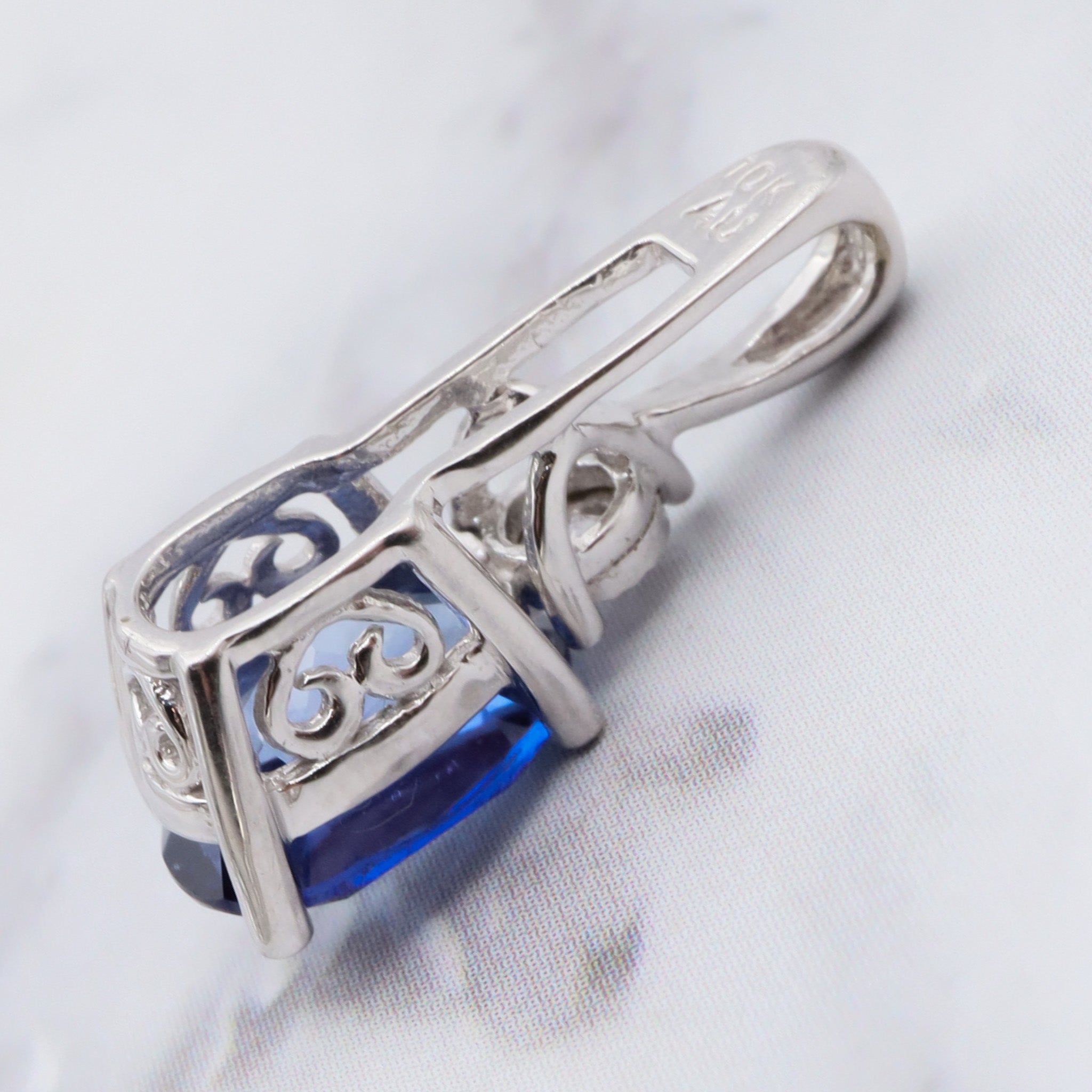 Vintage 10k gold diamond and simulated sapphire pendant