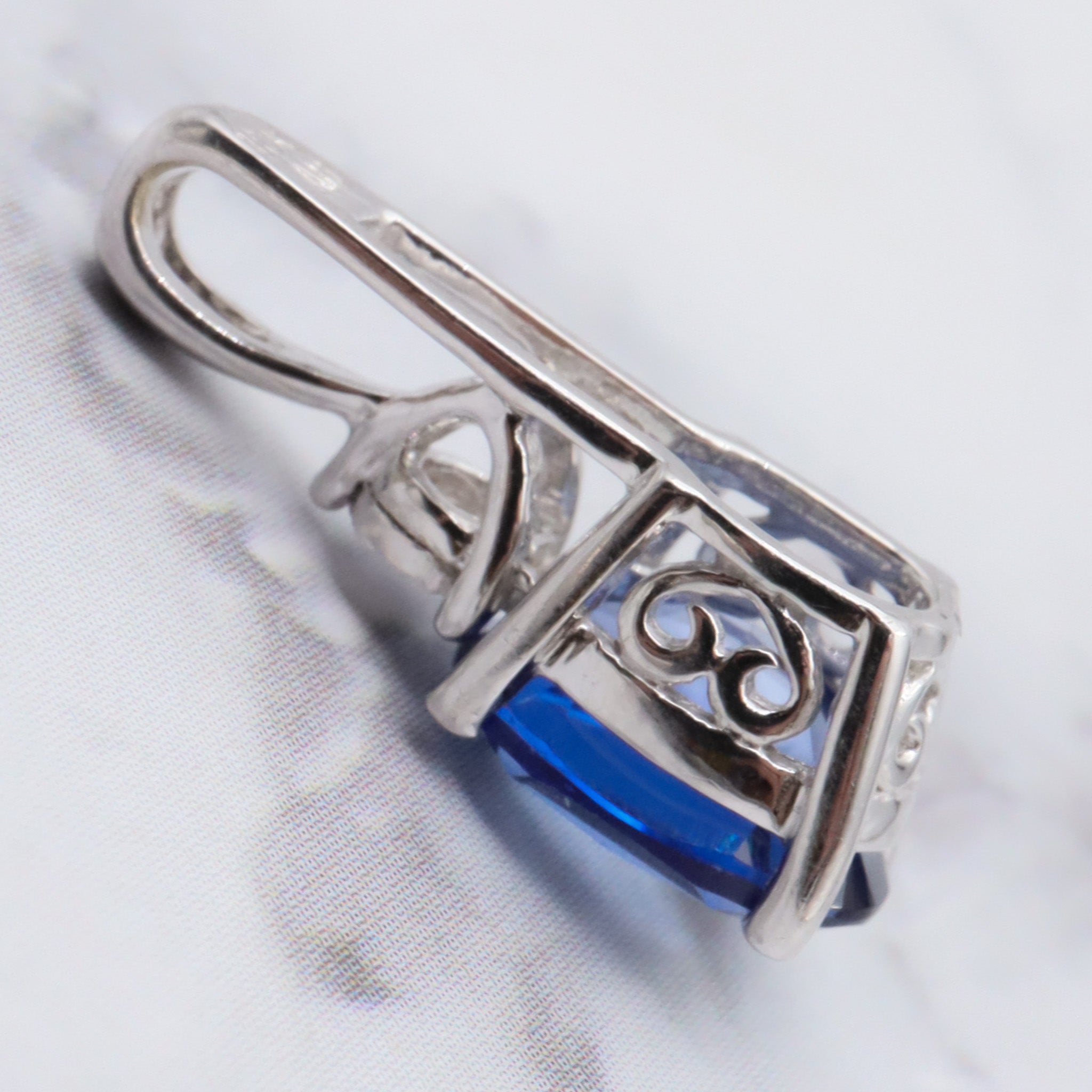 Vintage 10k gold diamond and simulated sapphire pendant