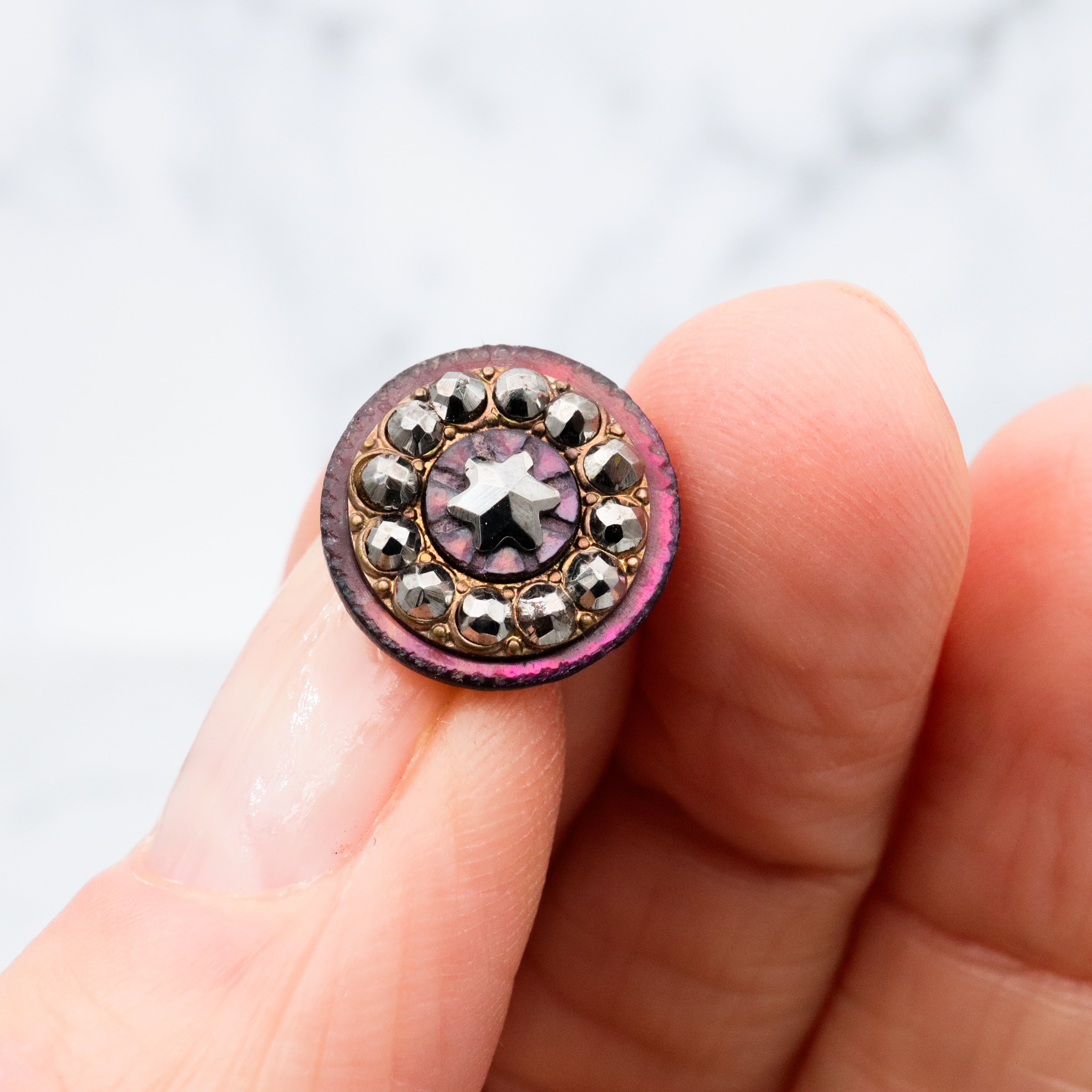 Set of 7 Antique Victorian purple shell cut steel rivet buttons