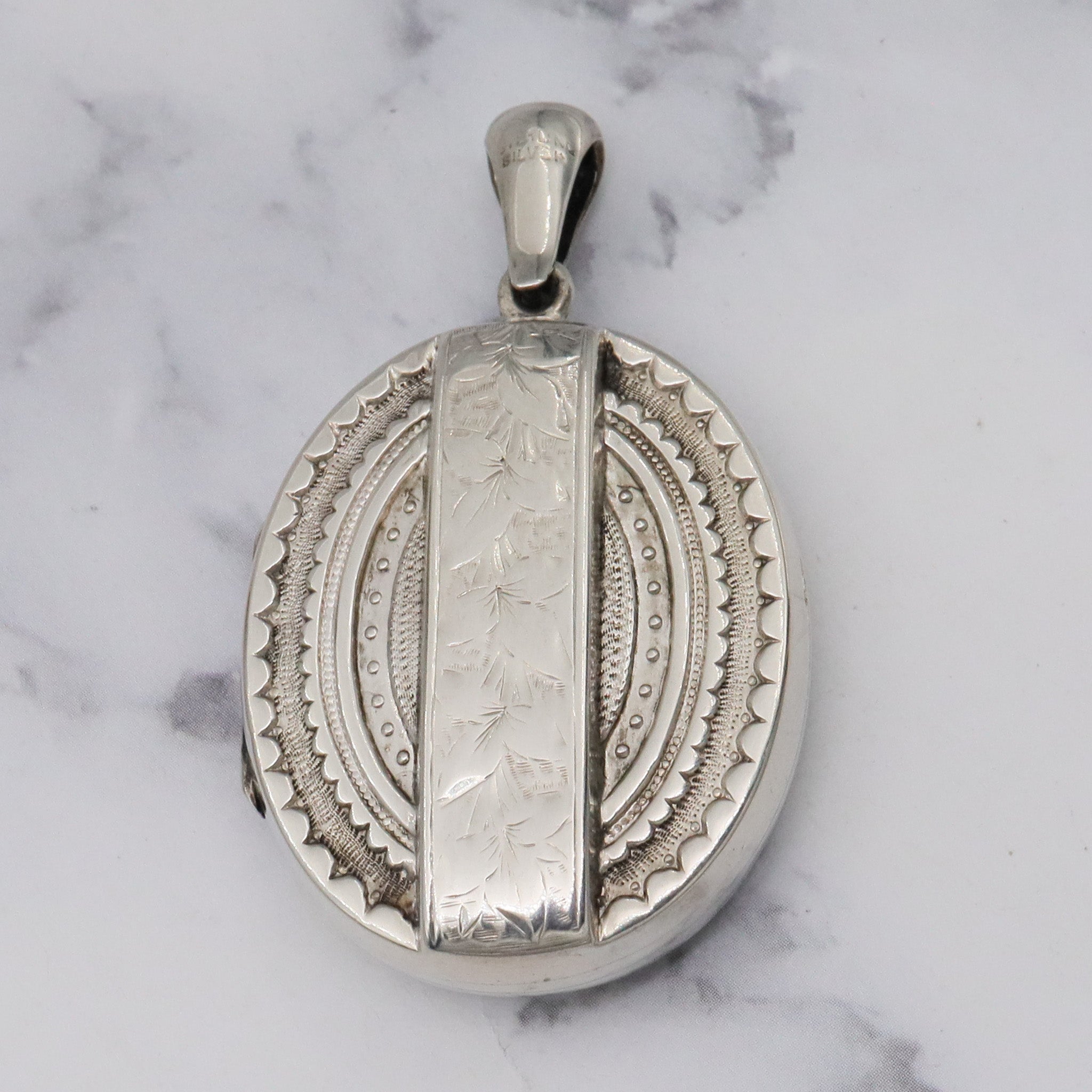 Antique Victorian engraved sterling locket