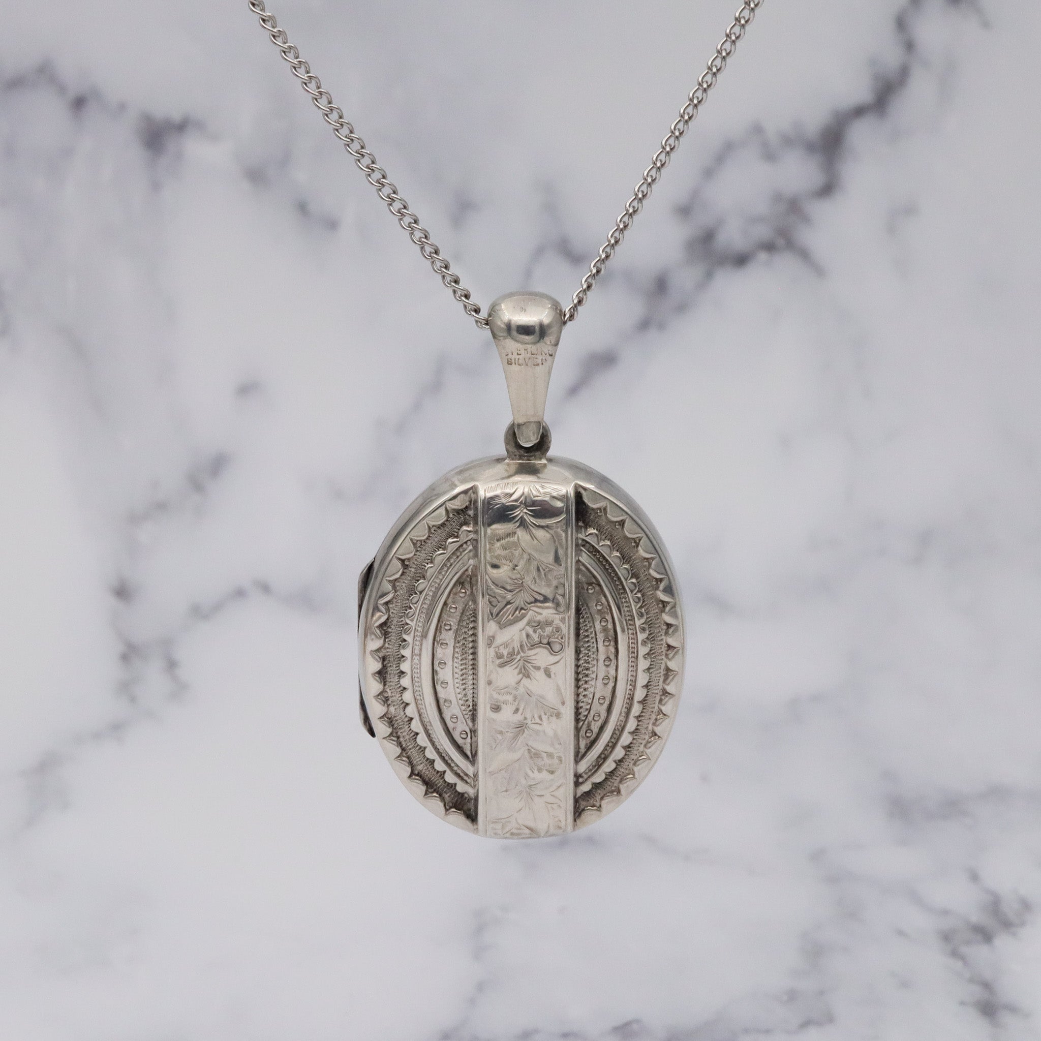 Antique Victorian engraved sterling locket
