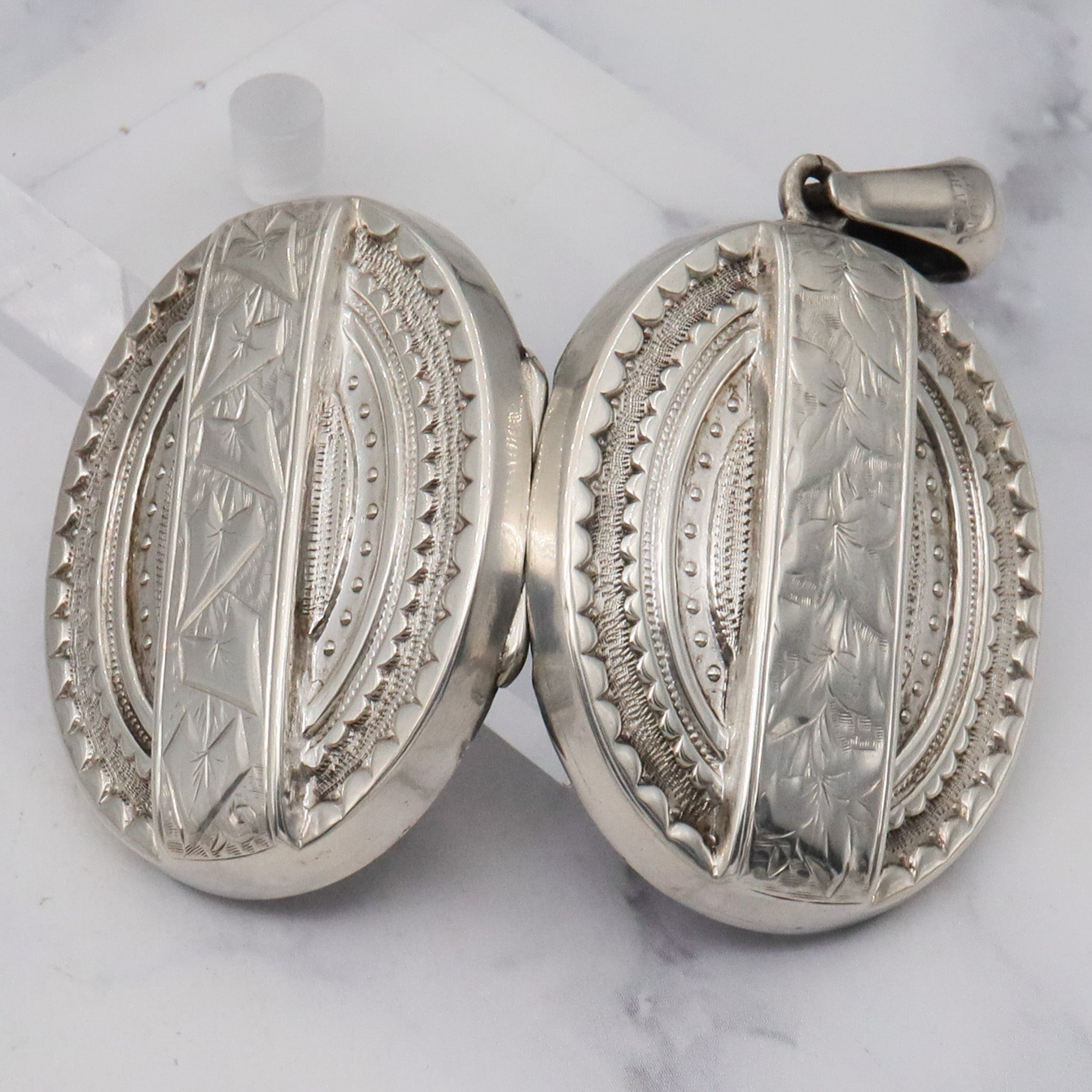 Antique Victorian engraved sterling locket