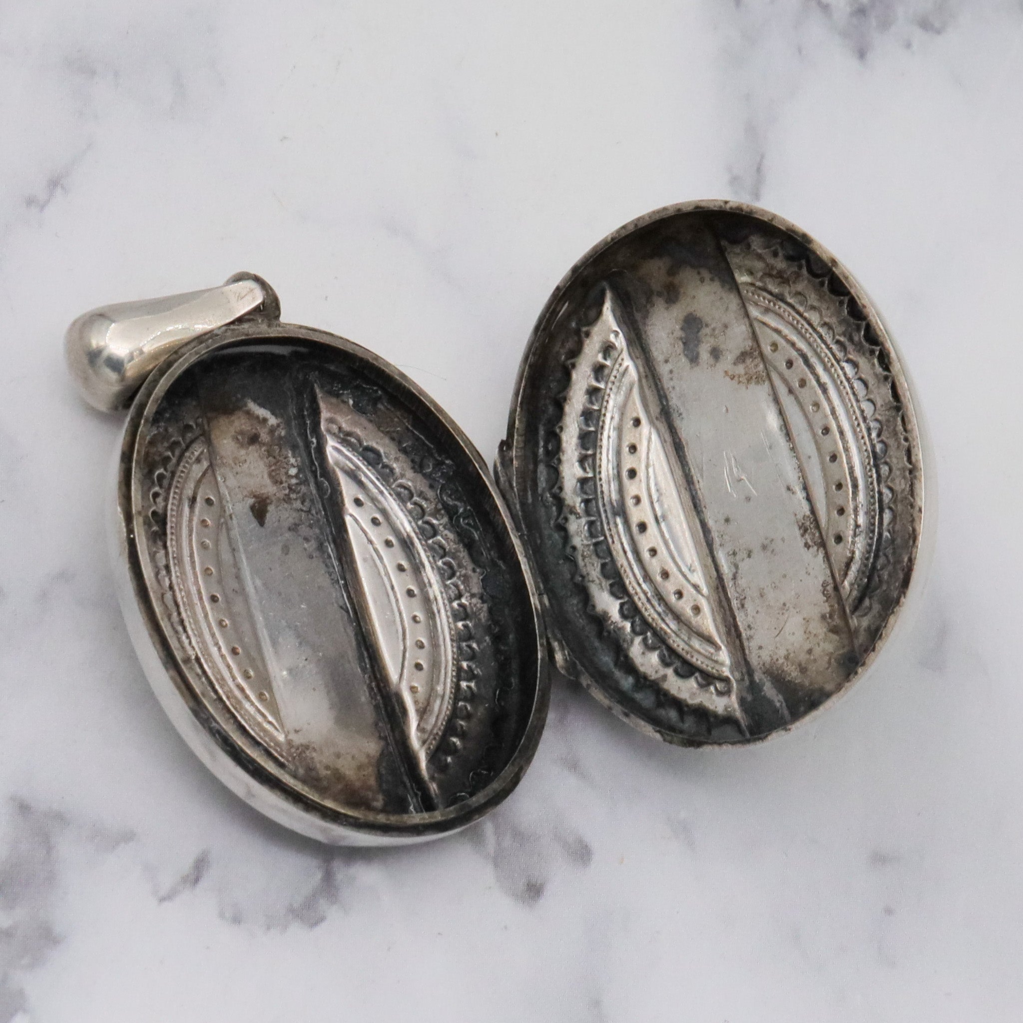 Antique Victorian engraved sterling locket