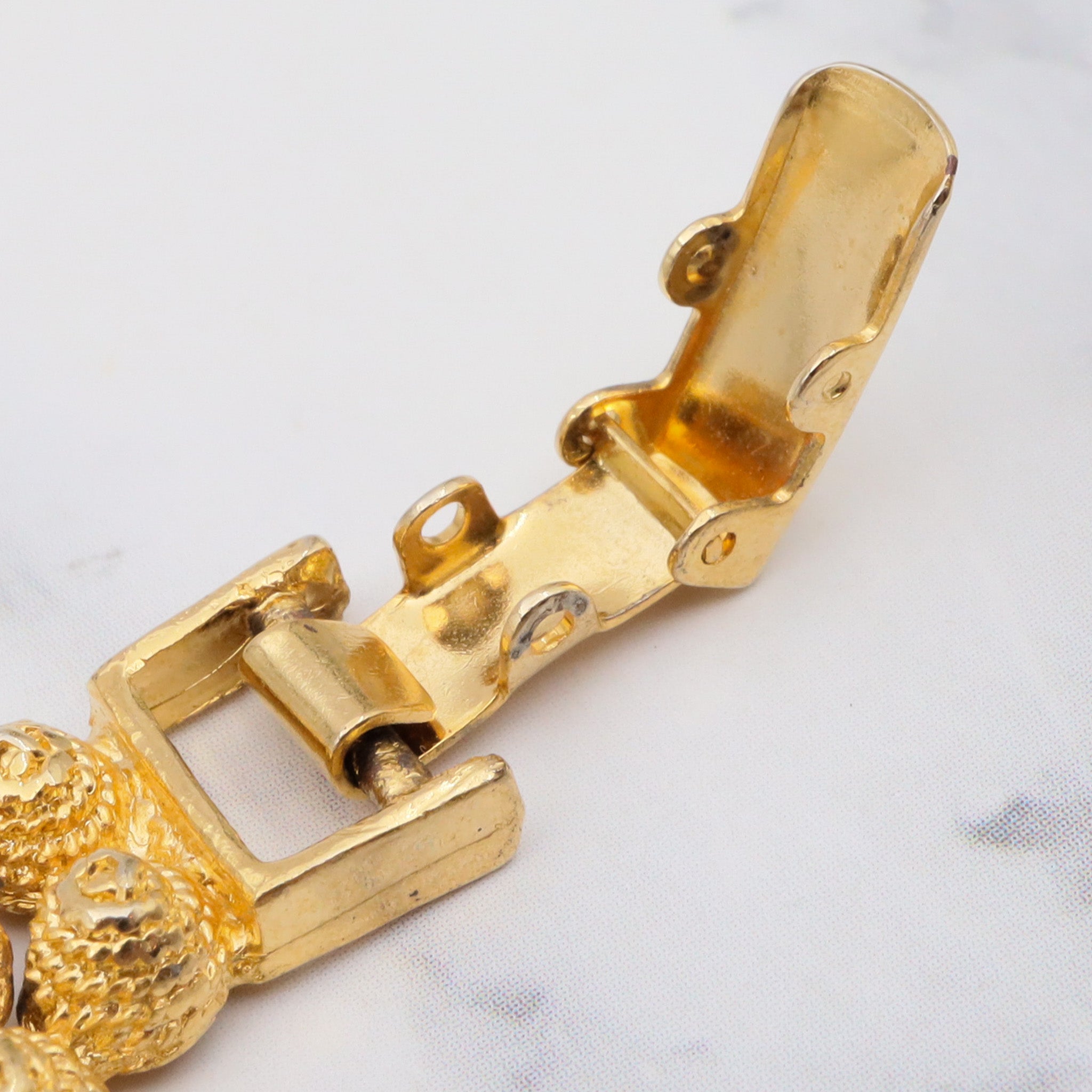 Vintage gold plated textured attached bead necklace with black glass tips