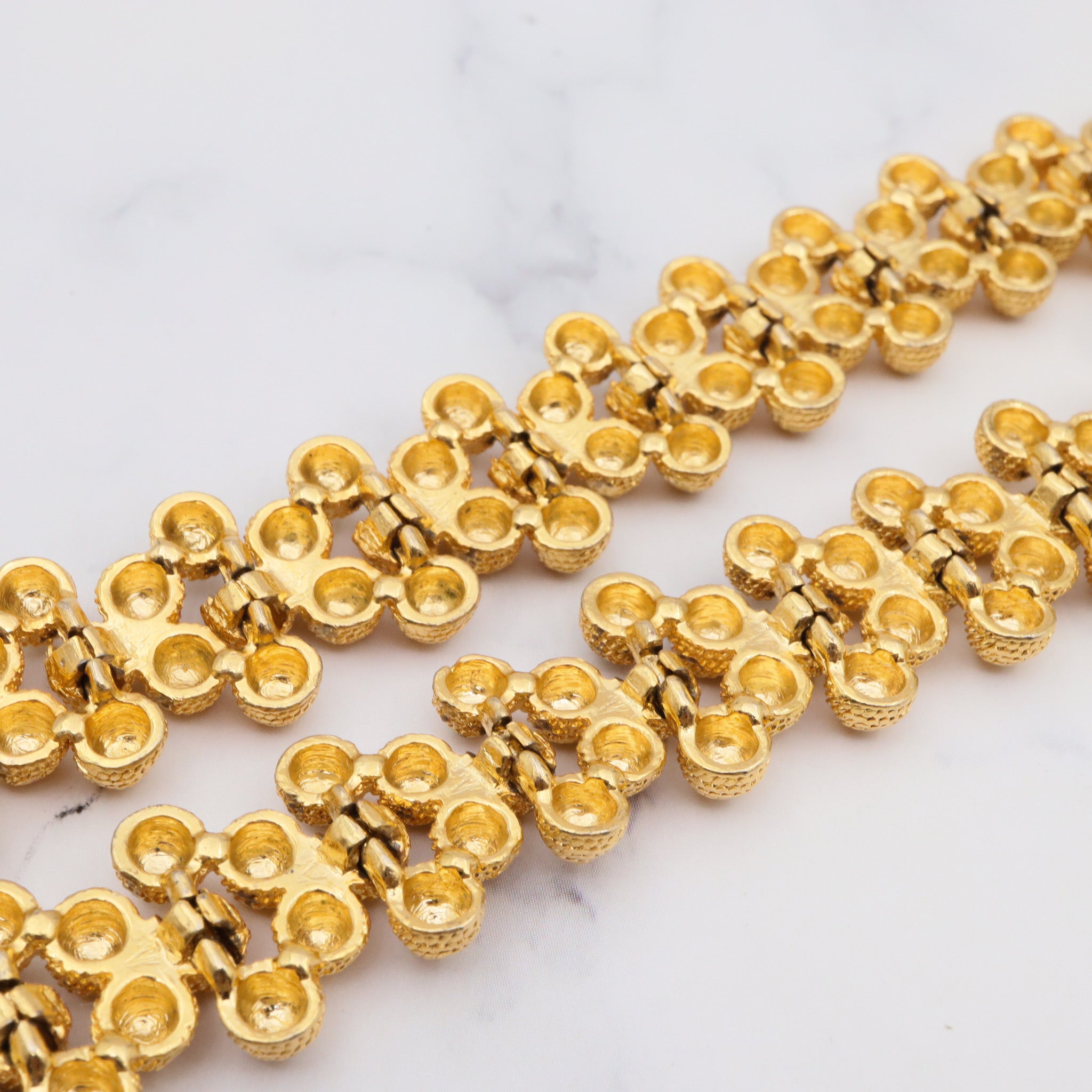 Vintage gold plated textured attached bead necklace with black glass tips