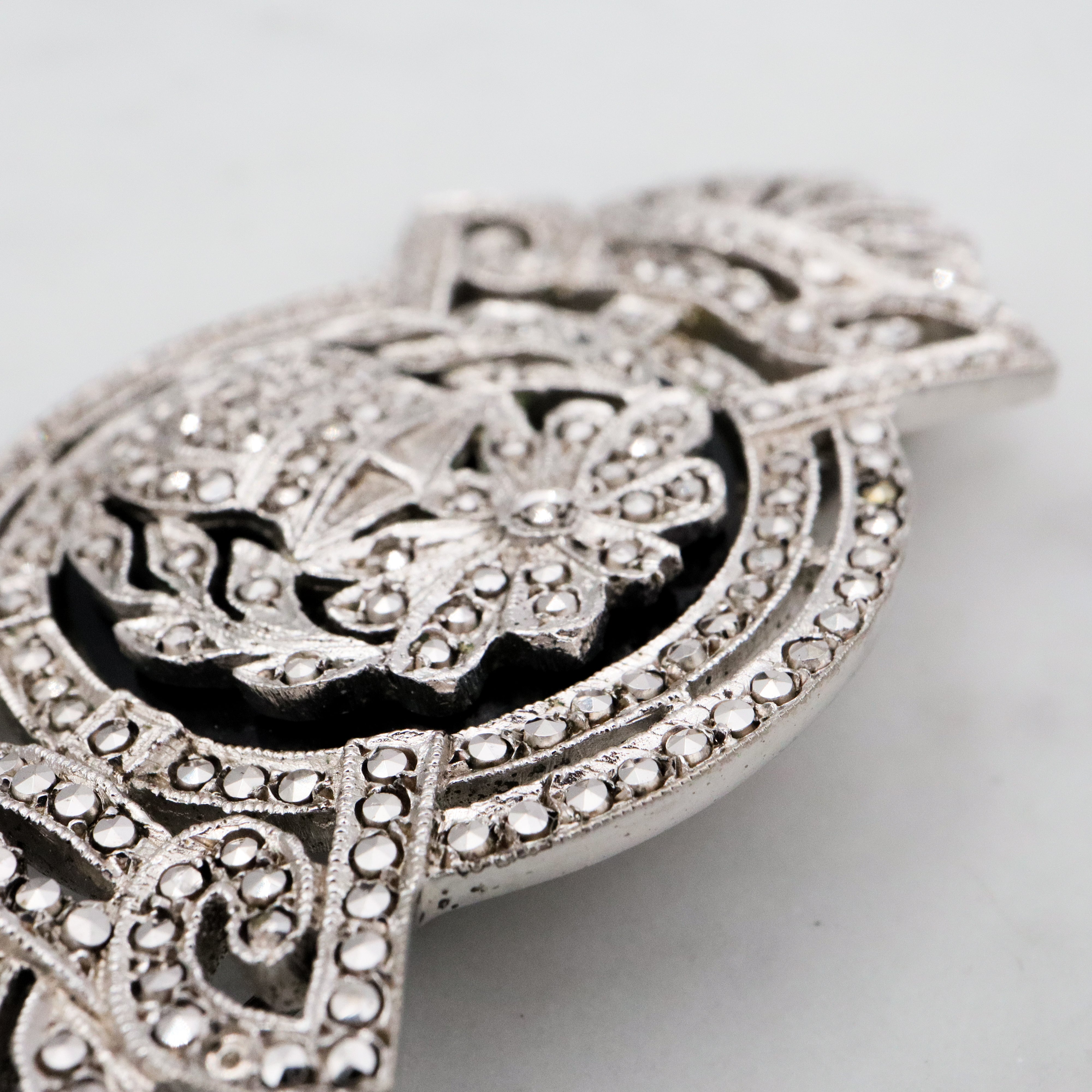 Antique Art Deco sterling marcasite floral framed brooch by EAGLE