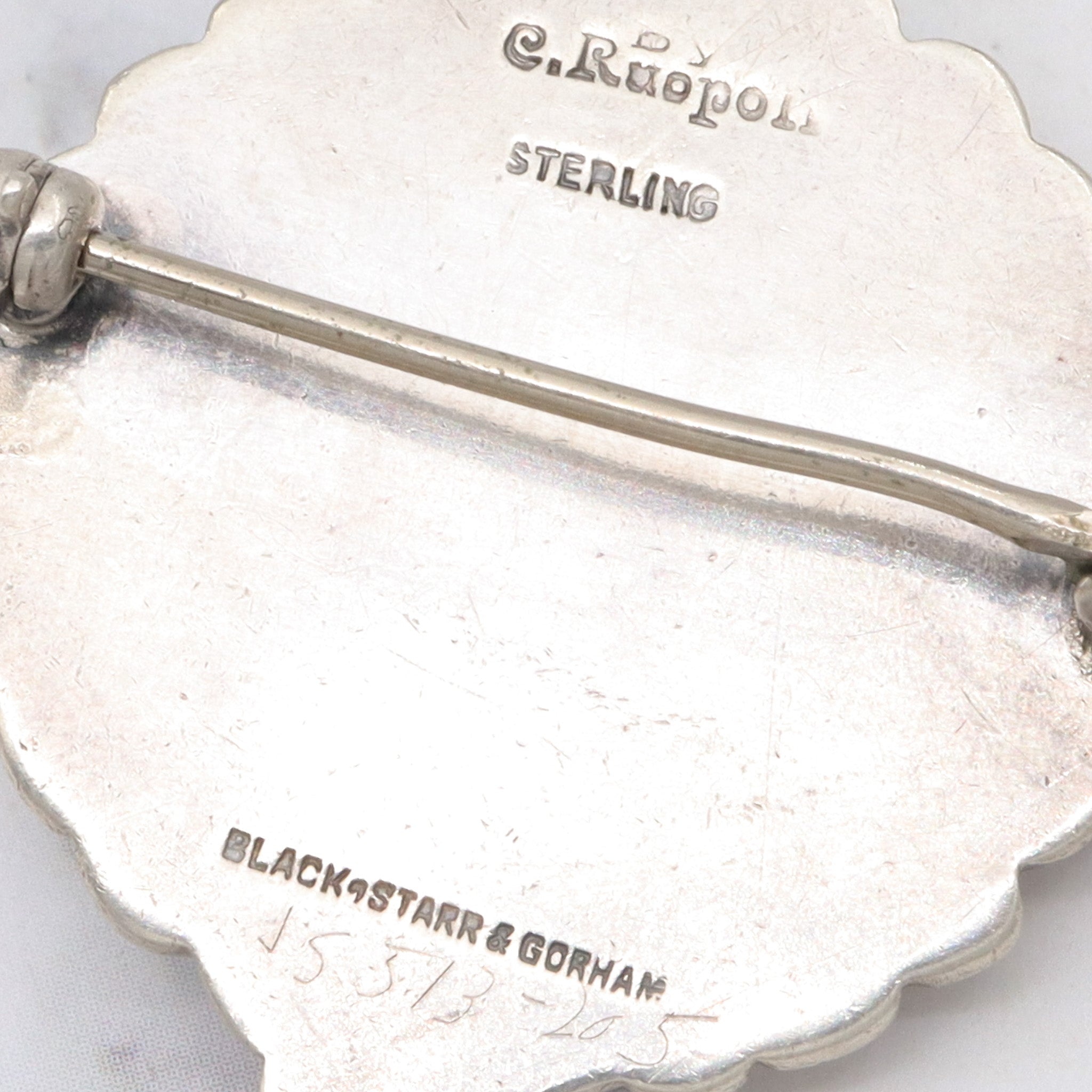 Pair of vintage Carl Ruopoli Mid-Century sterling swirl pins