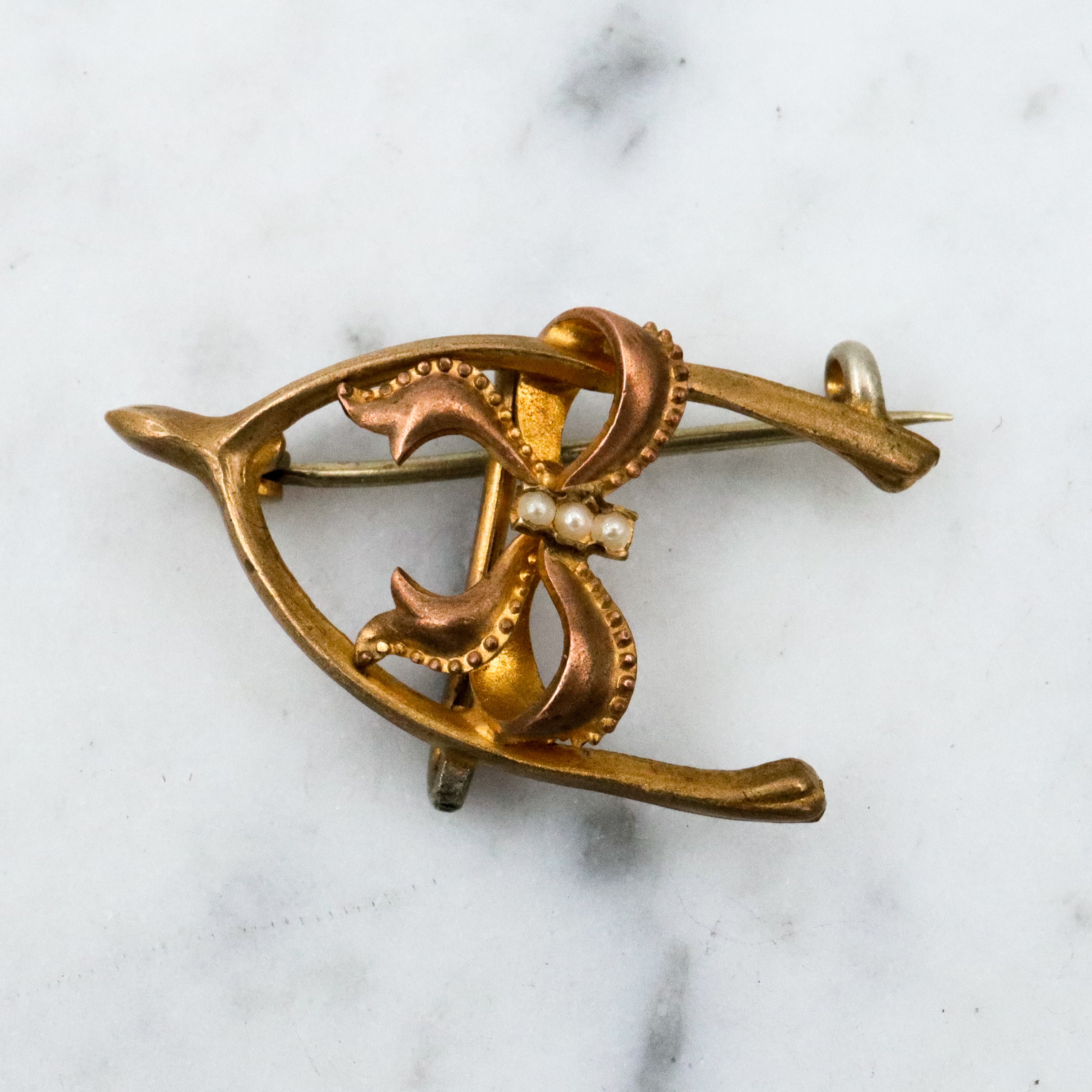 Antique Victorian gilt metal wishbone & bow watch clip brooch