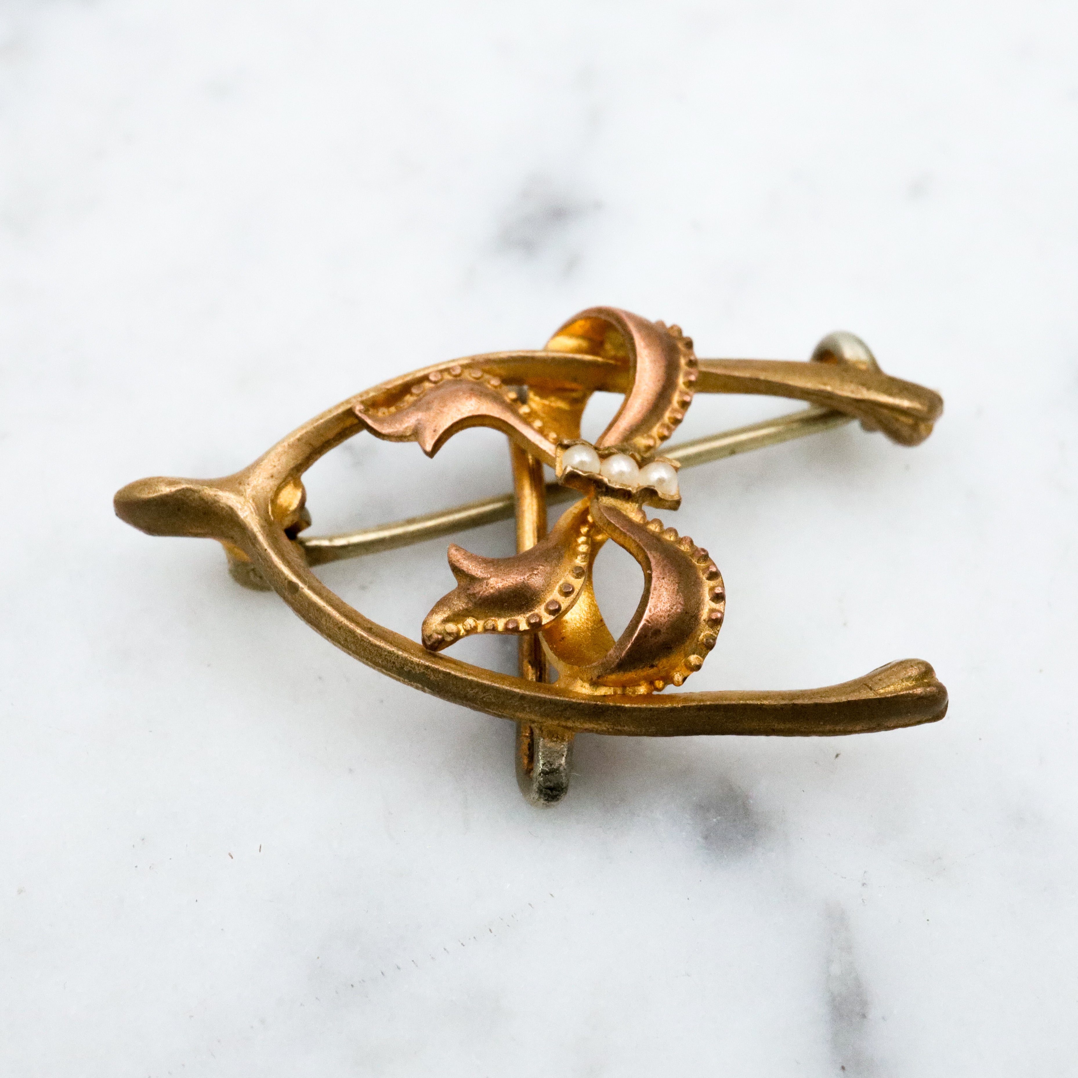 Antique Victorian gilt metal wishbone & bow watch clip brooch