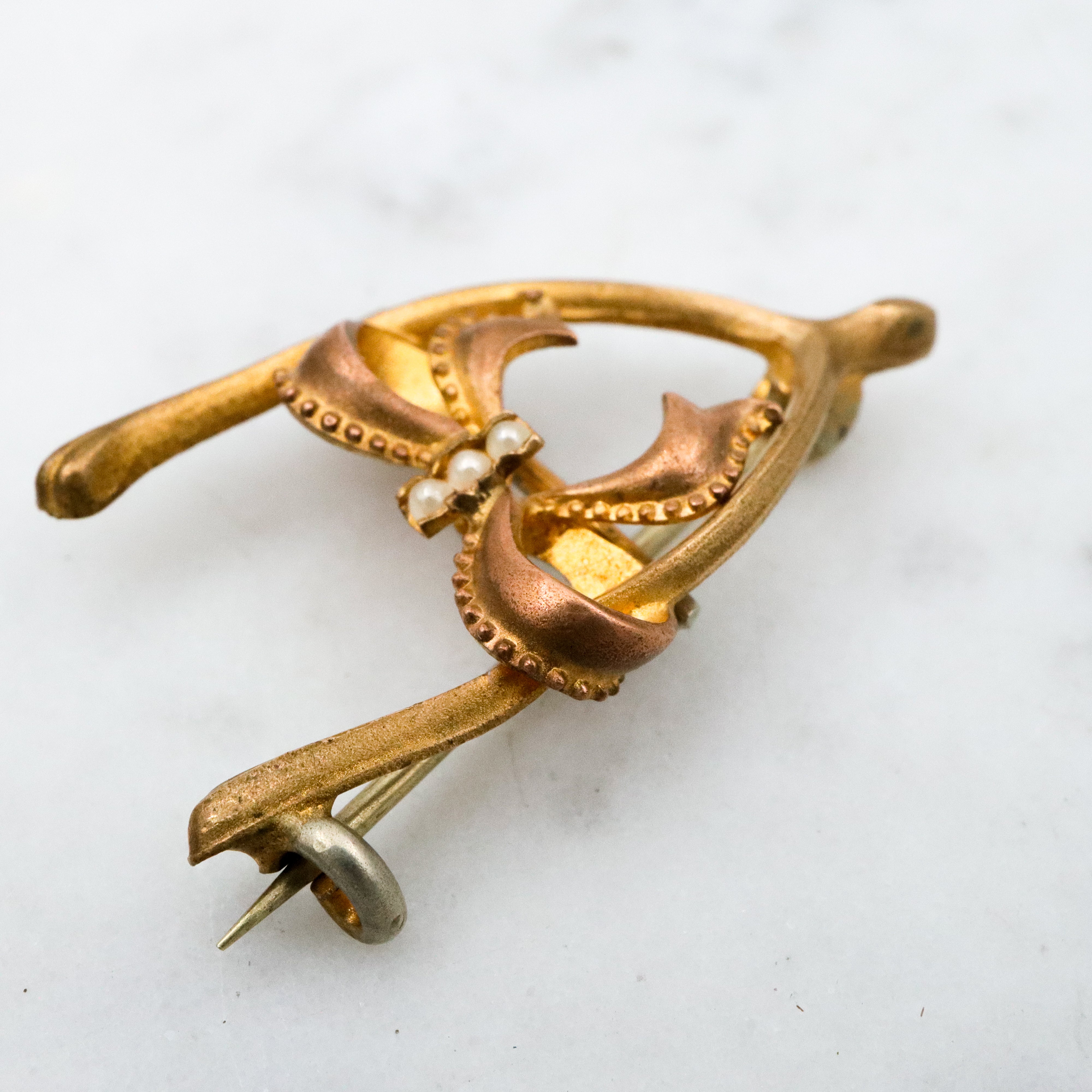 Antique Victorian gilt metal wishbone & bow watch clip brooch