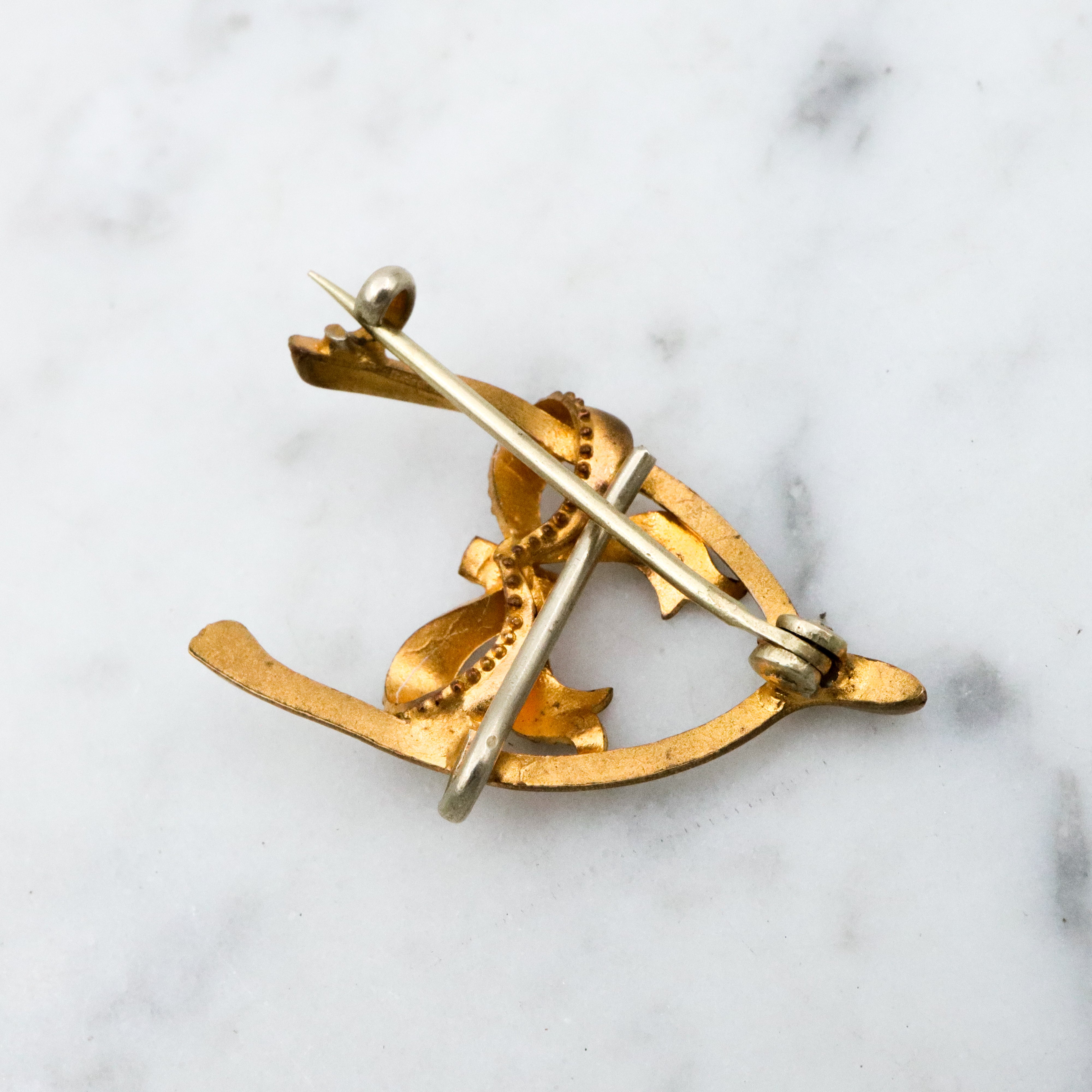 Antique Victorian gilt metal wishbone & bow watch clip brooch