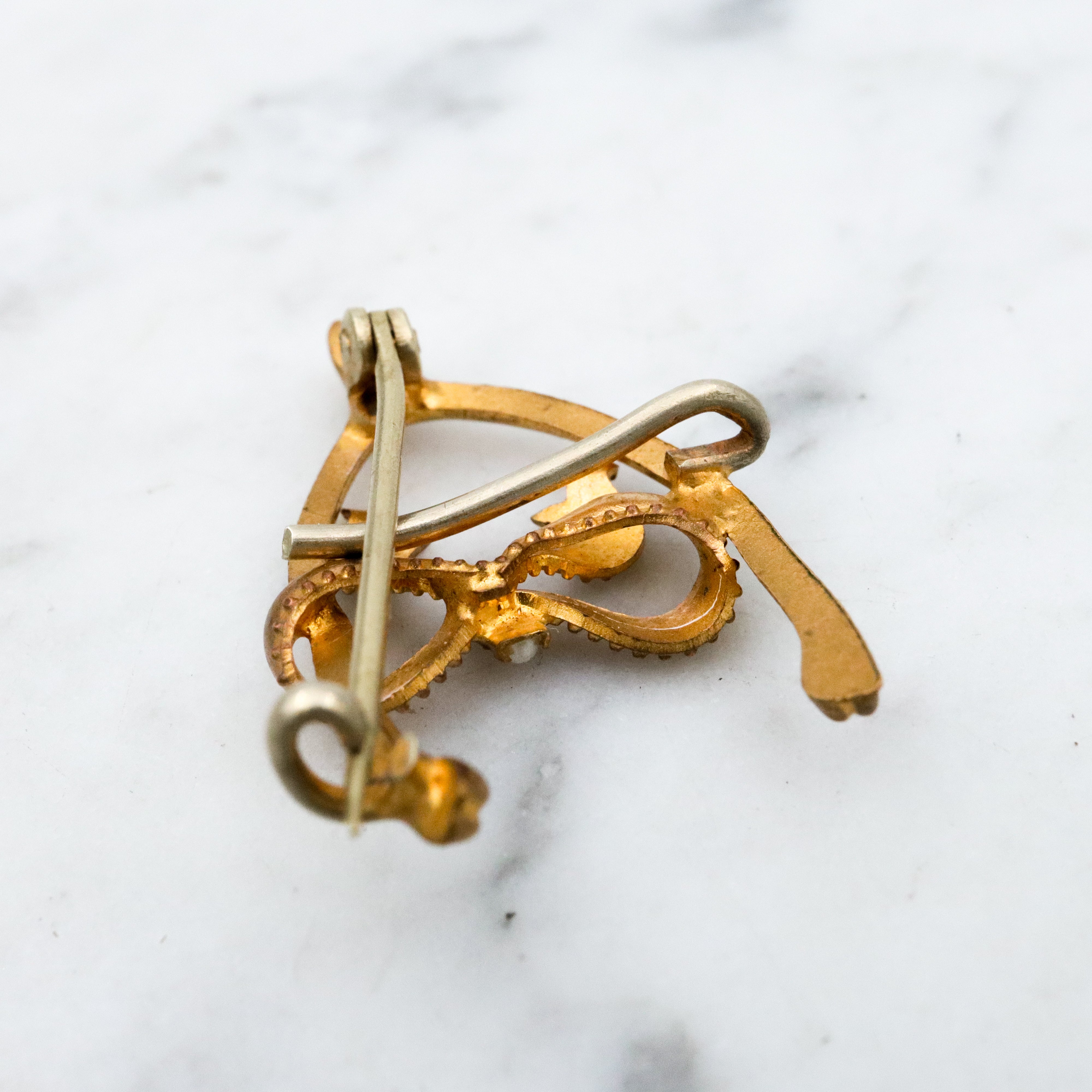 Antique Victorian gilt metal wishbone & bow watch clip brooch