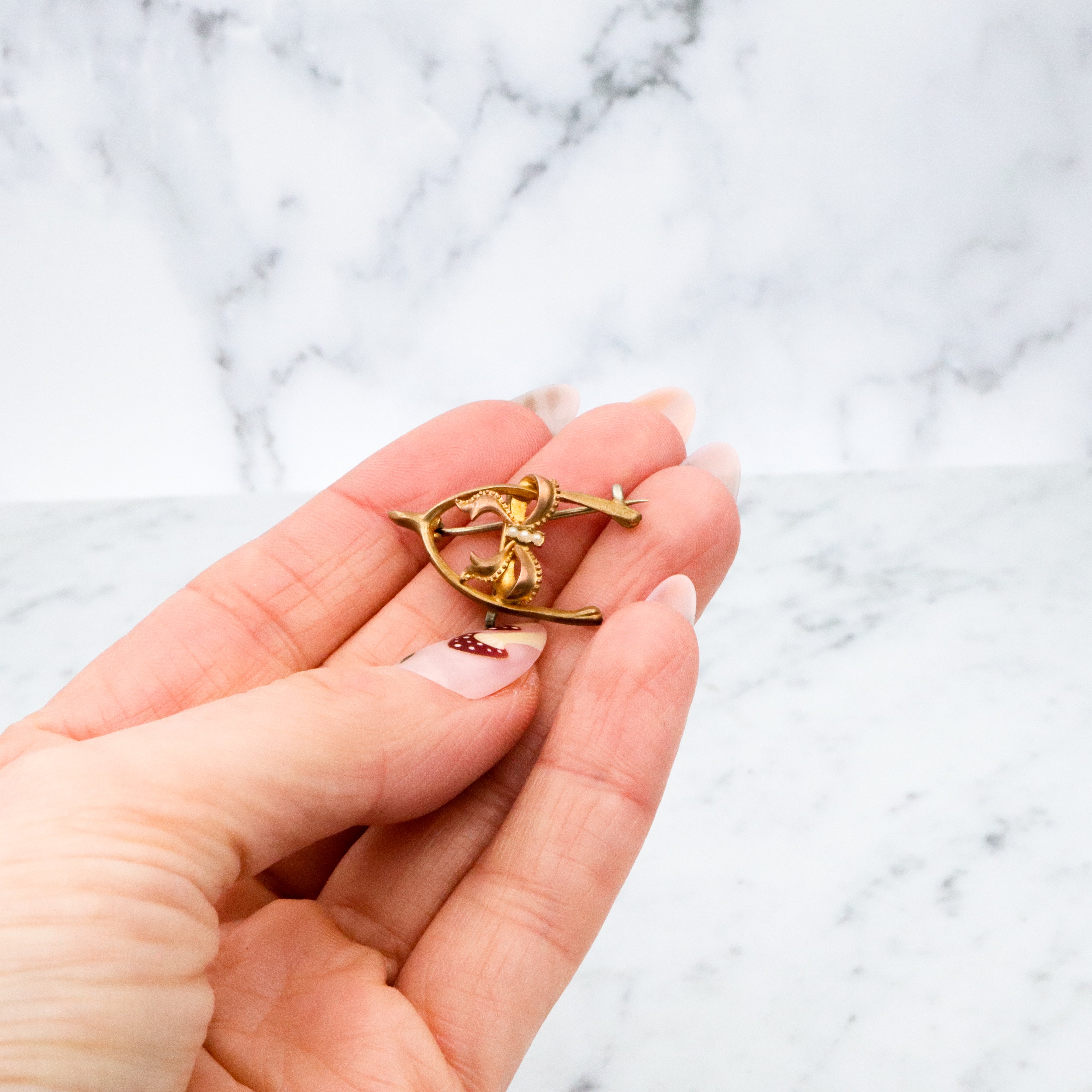 Antique Victorian gilt metal wishbone & bow watch clip brooch