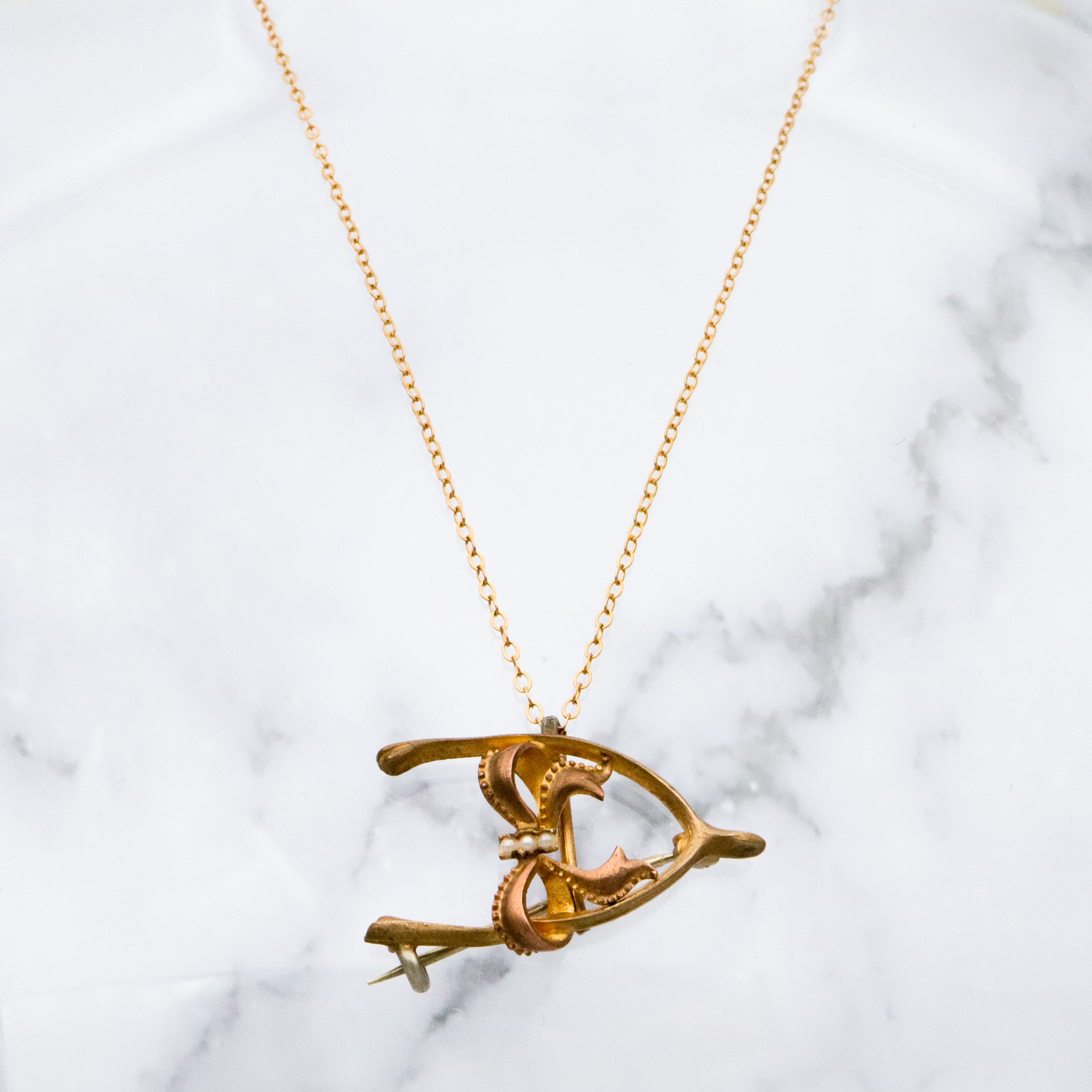 Antique Victorian gilt metal wishbone & bow watch clip brooch