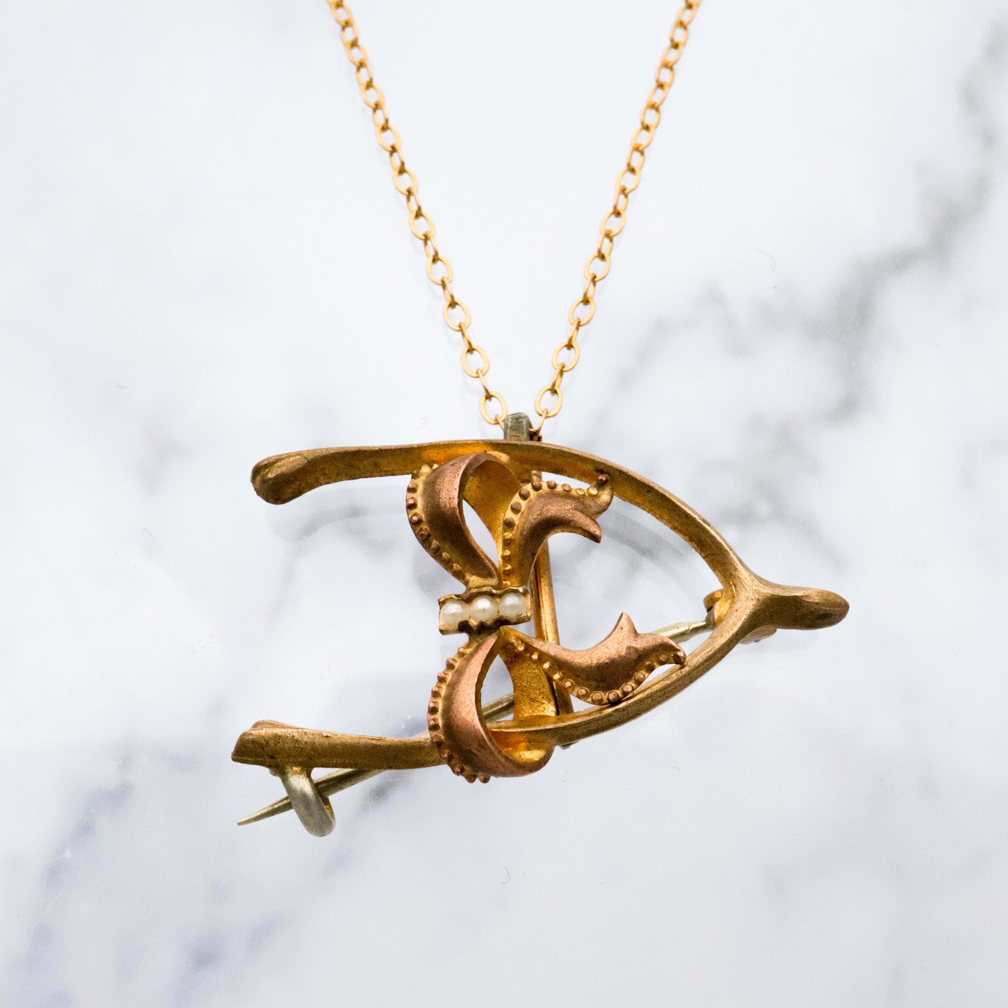 Antique Victorian gilt metal wishbone & bow watch clip brooch