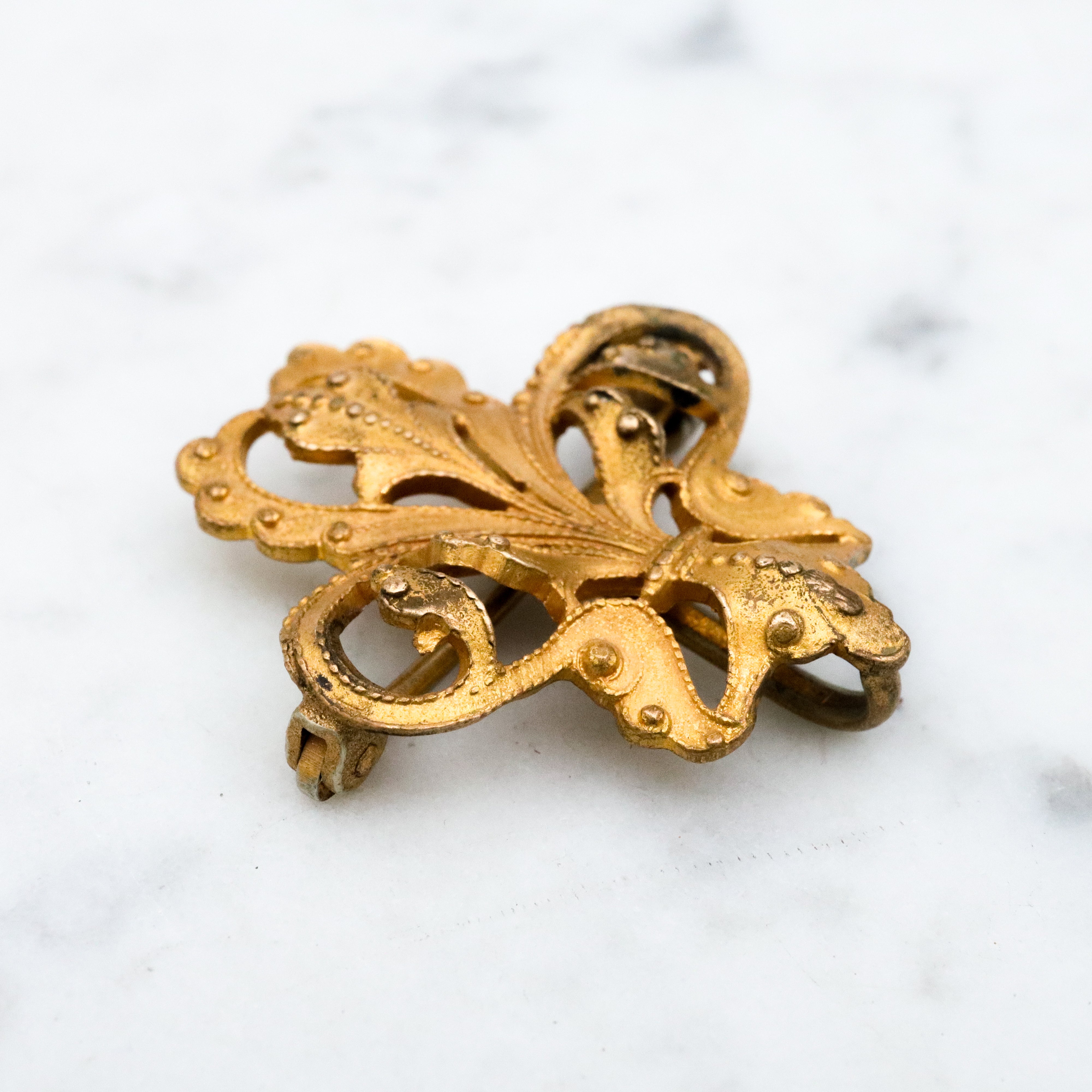 Antique Victorian gilt metal fancy fleur de lis watch clip pin