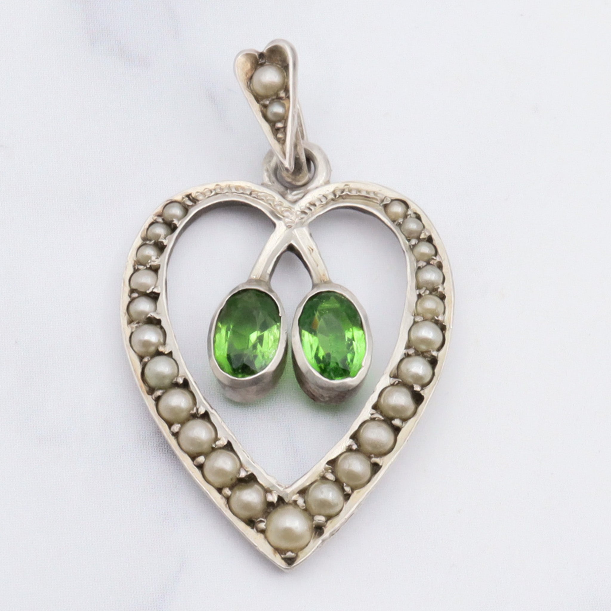 Antique victorian german 935 silver green paste and split pearl heart pendant