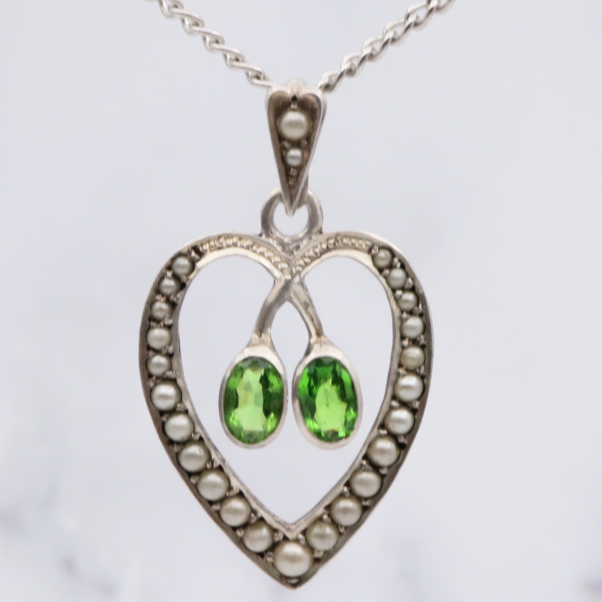 Antique victorian german 935 silver green paste and split pearl heart pendant