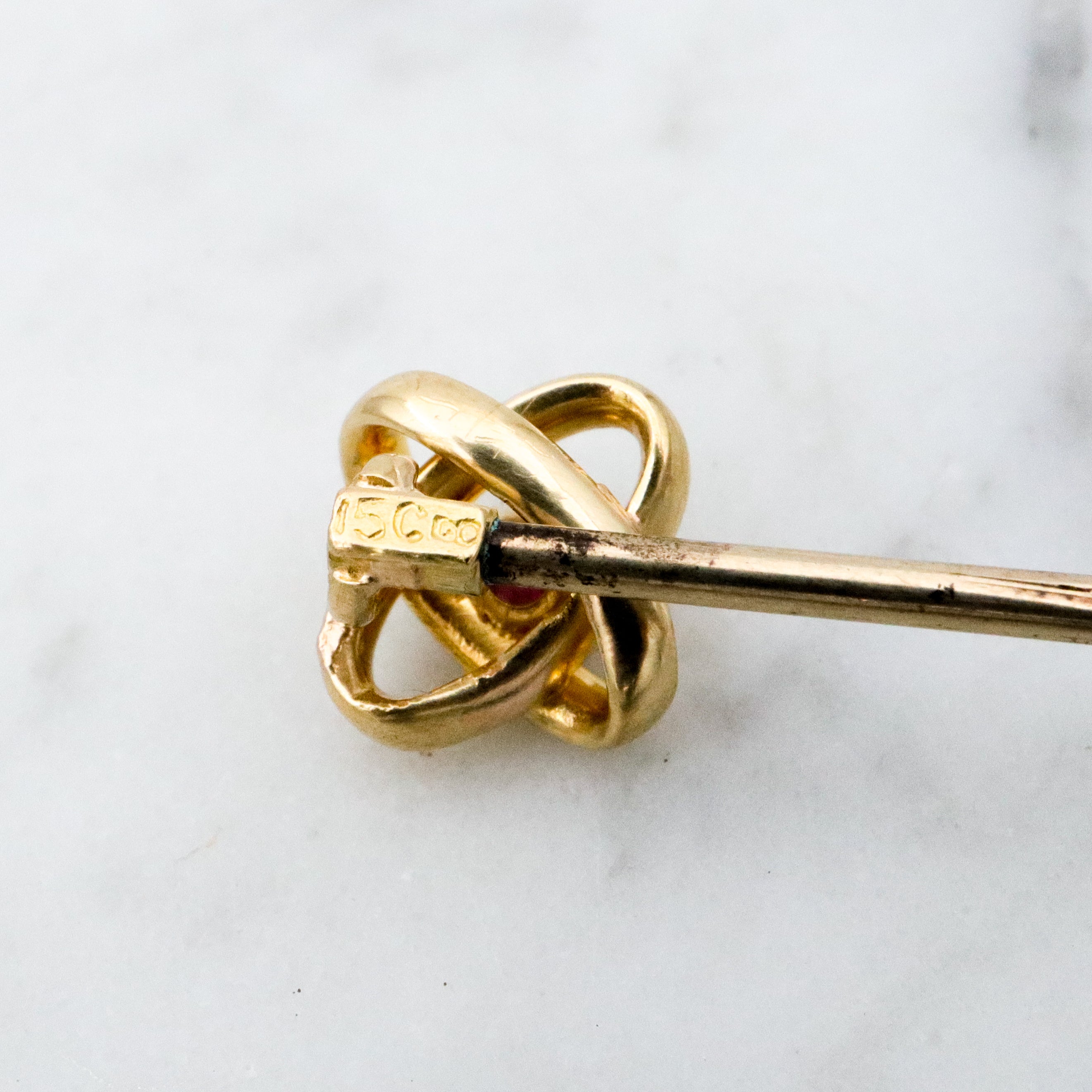 Antique Victorian 15k gold ruby infinity knot stick pin