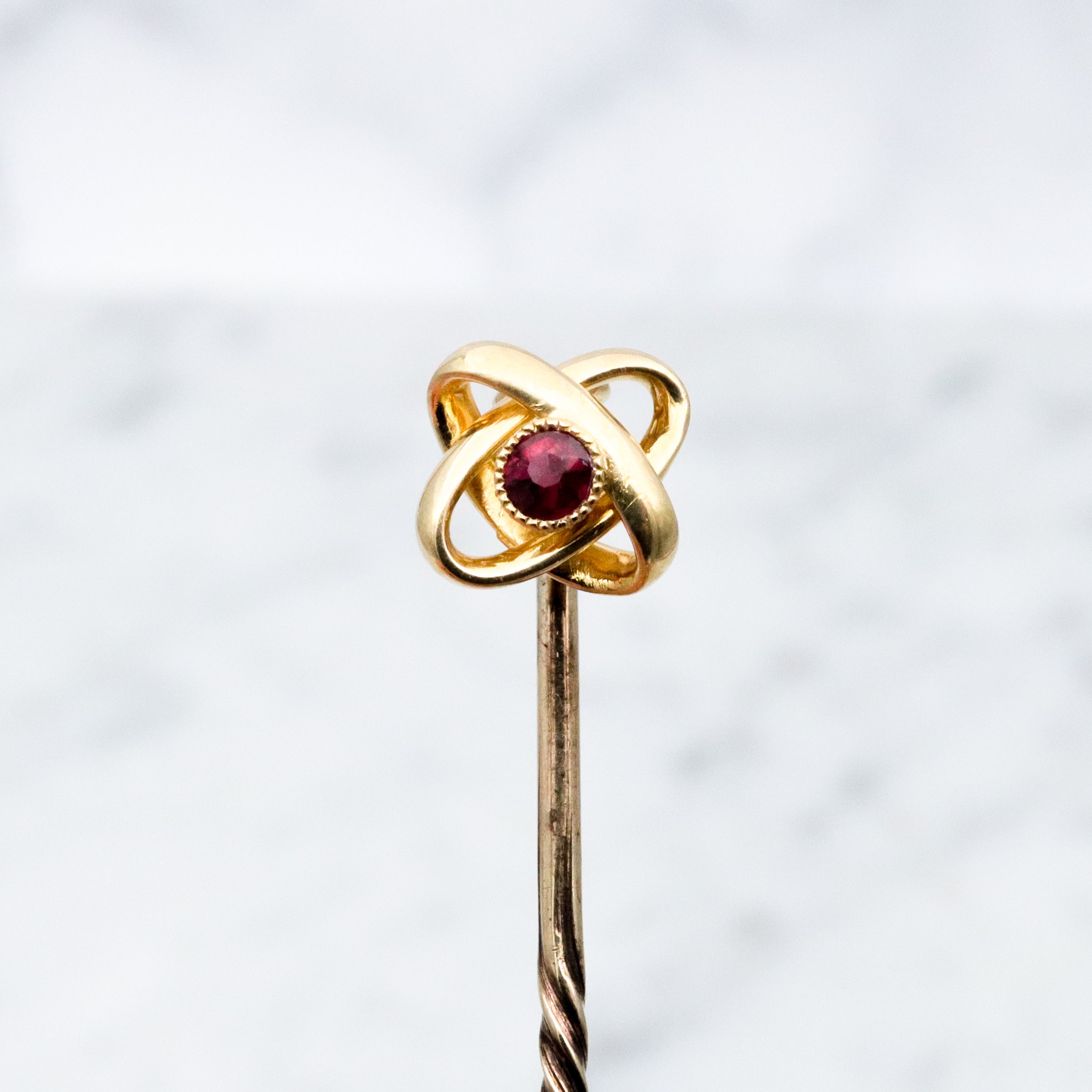 Antique Victorian 15k gold ruby infinity knot stick pin