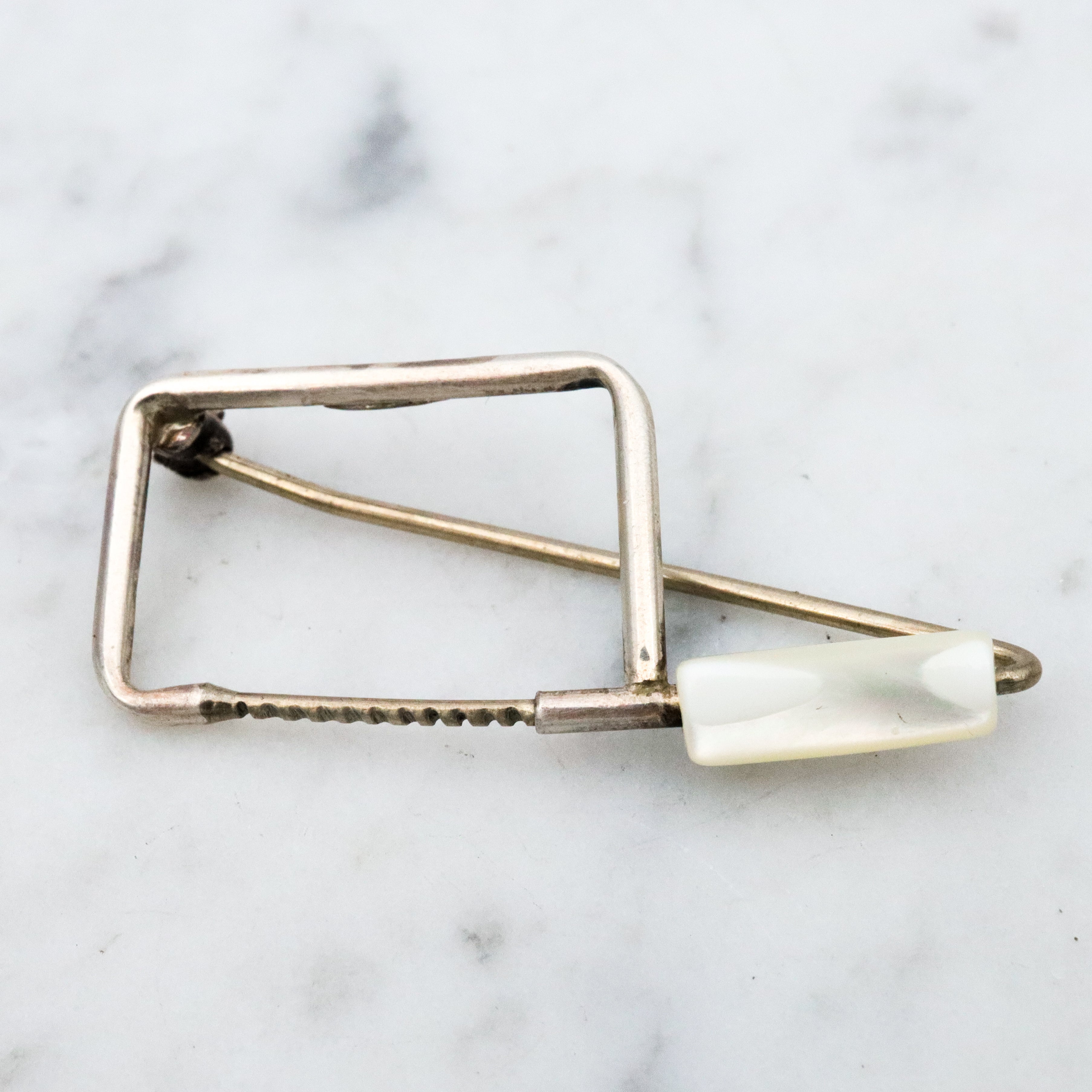 Unique one of a kind sterling & mother of pearl coping saw brooch
