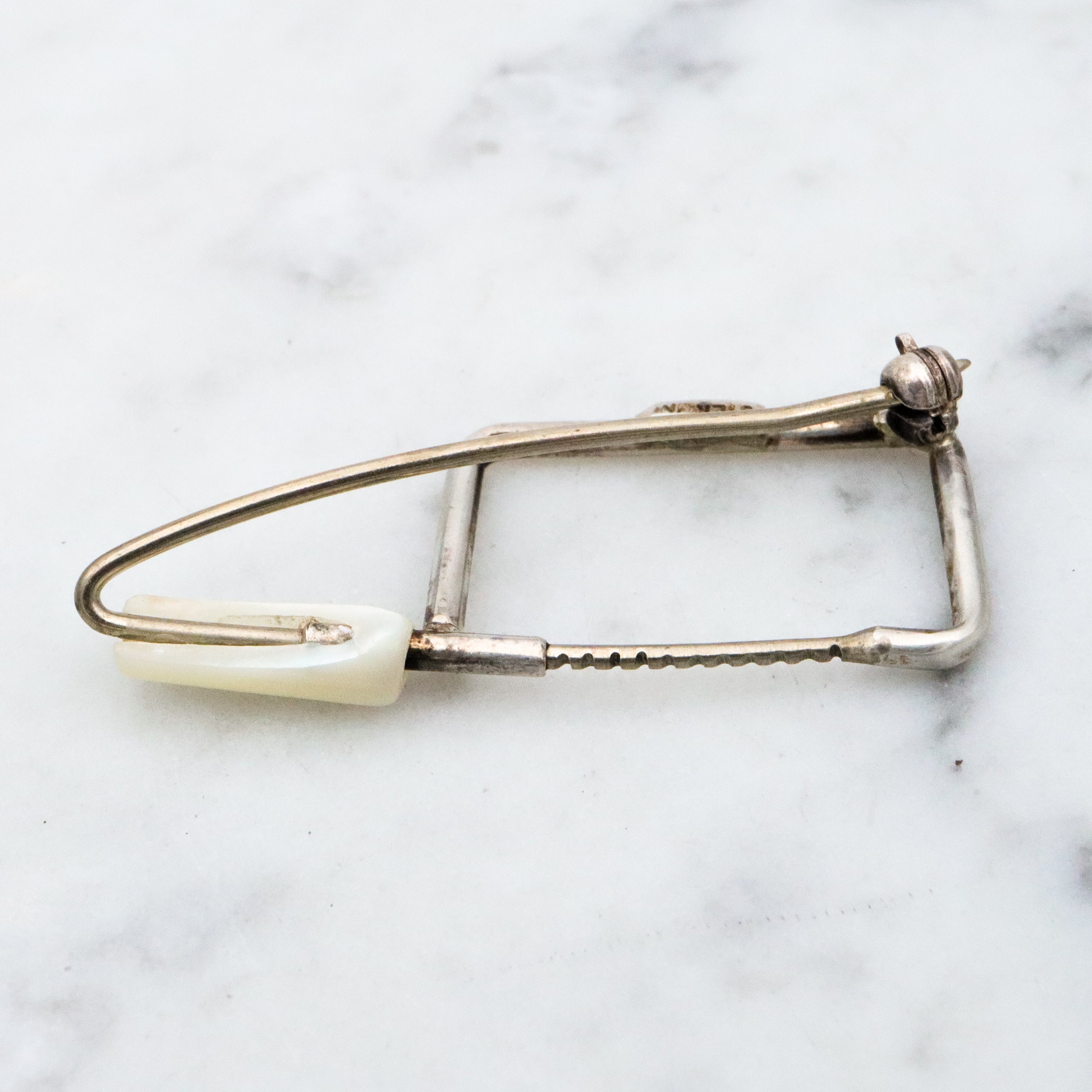 Unique one of a kind sterling & mother of pearl coping saw brooch
