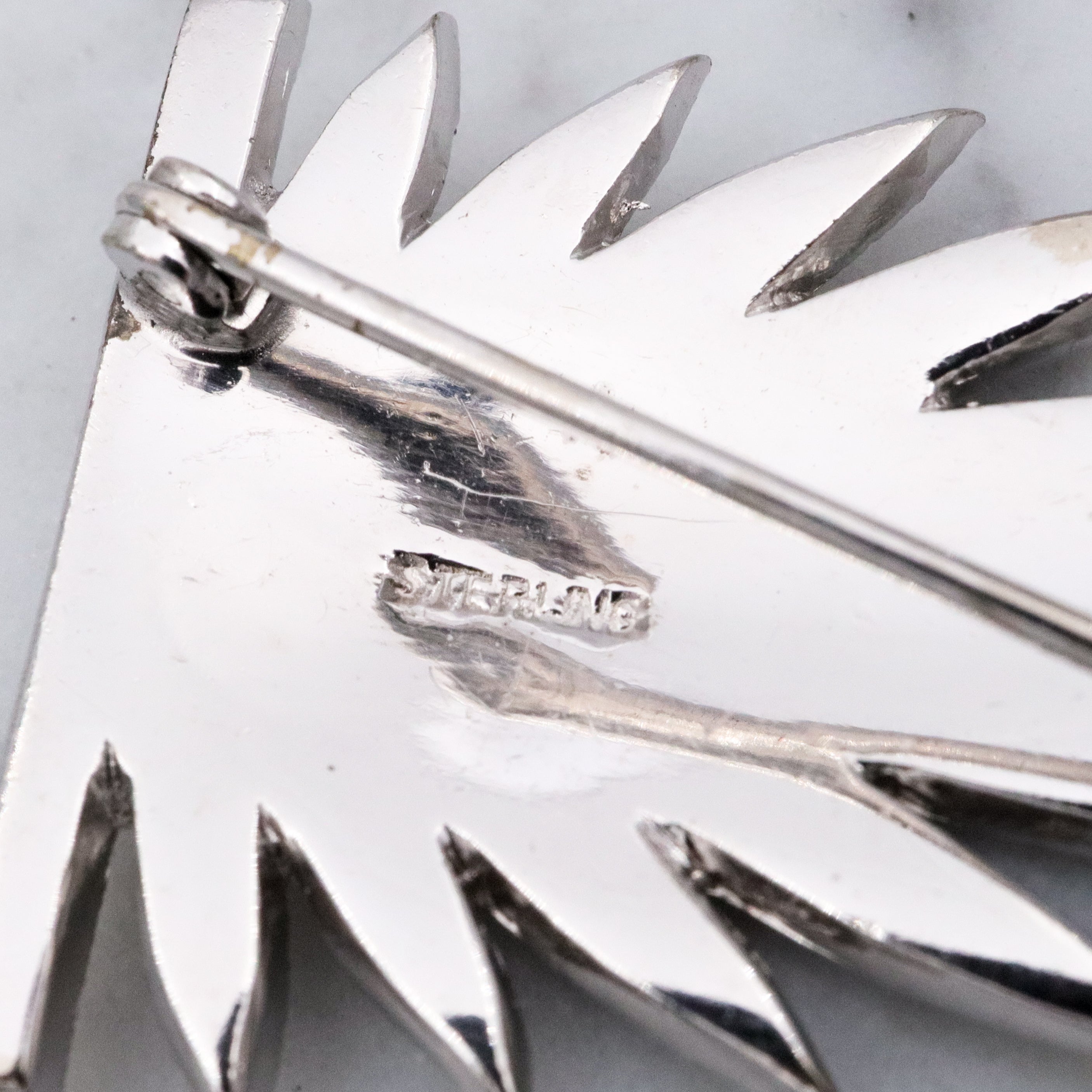 Antique Art Deco sterling marcasite leaf frond brooch