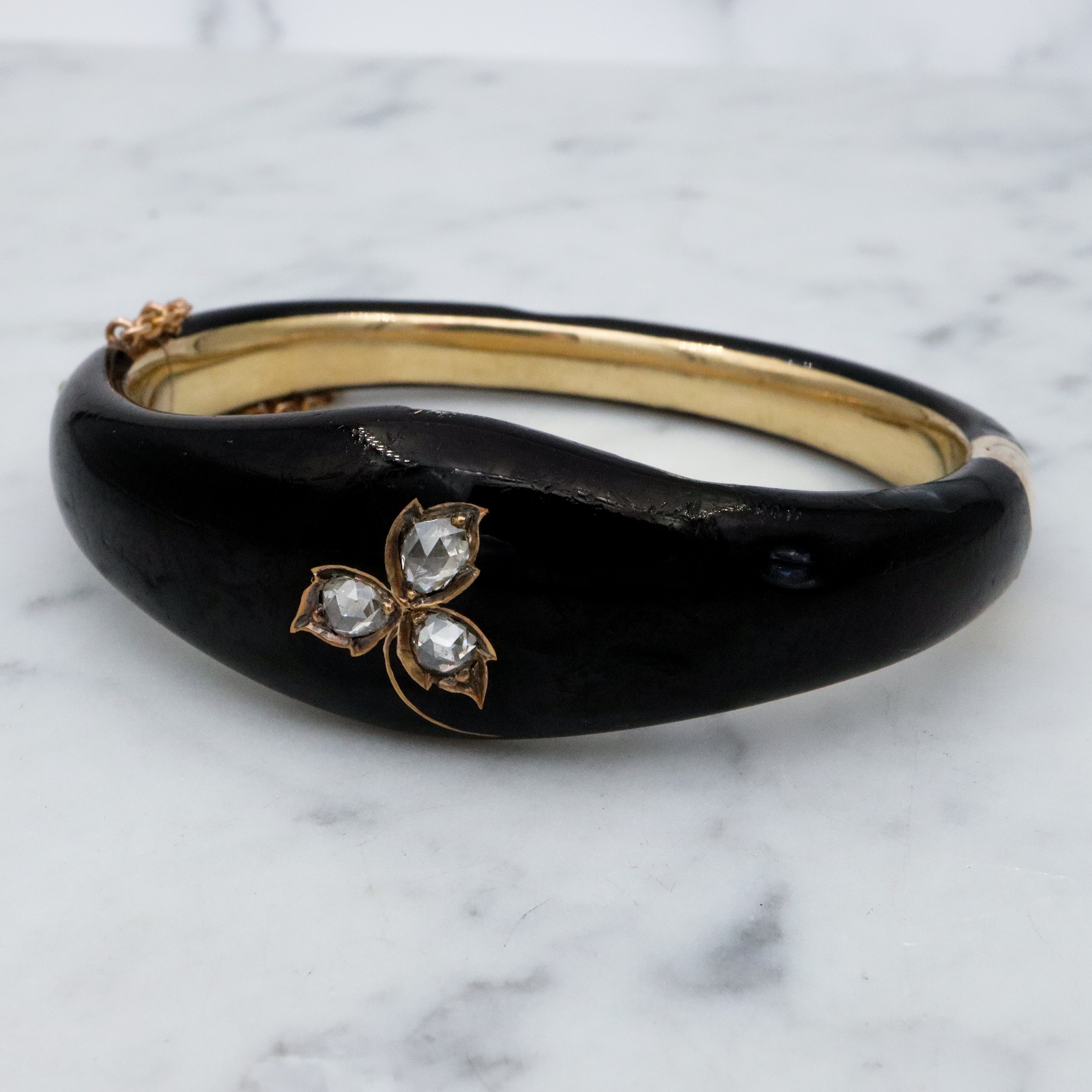 Antique Victorian 14k gold black enamel mourning bangle with rose cut diamonds