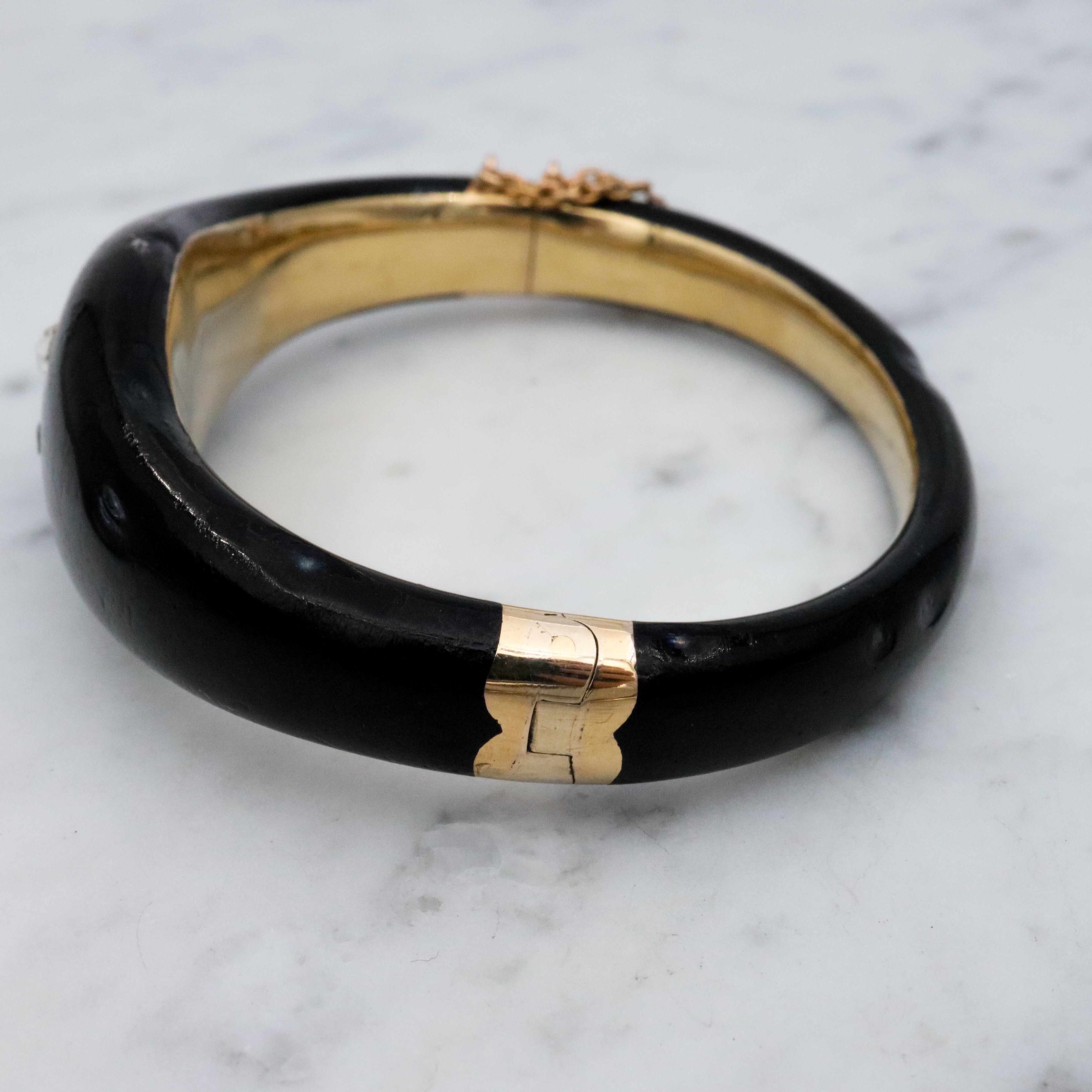 Antique Victorian 14k gold black enamel mourning bangle with rose cut diamonds