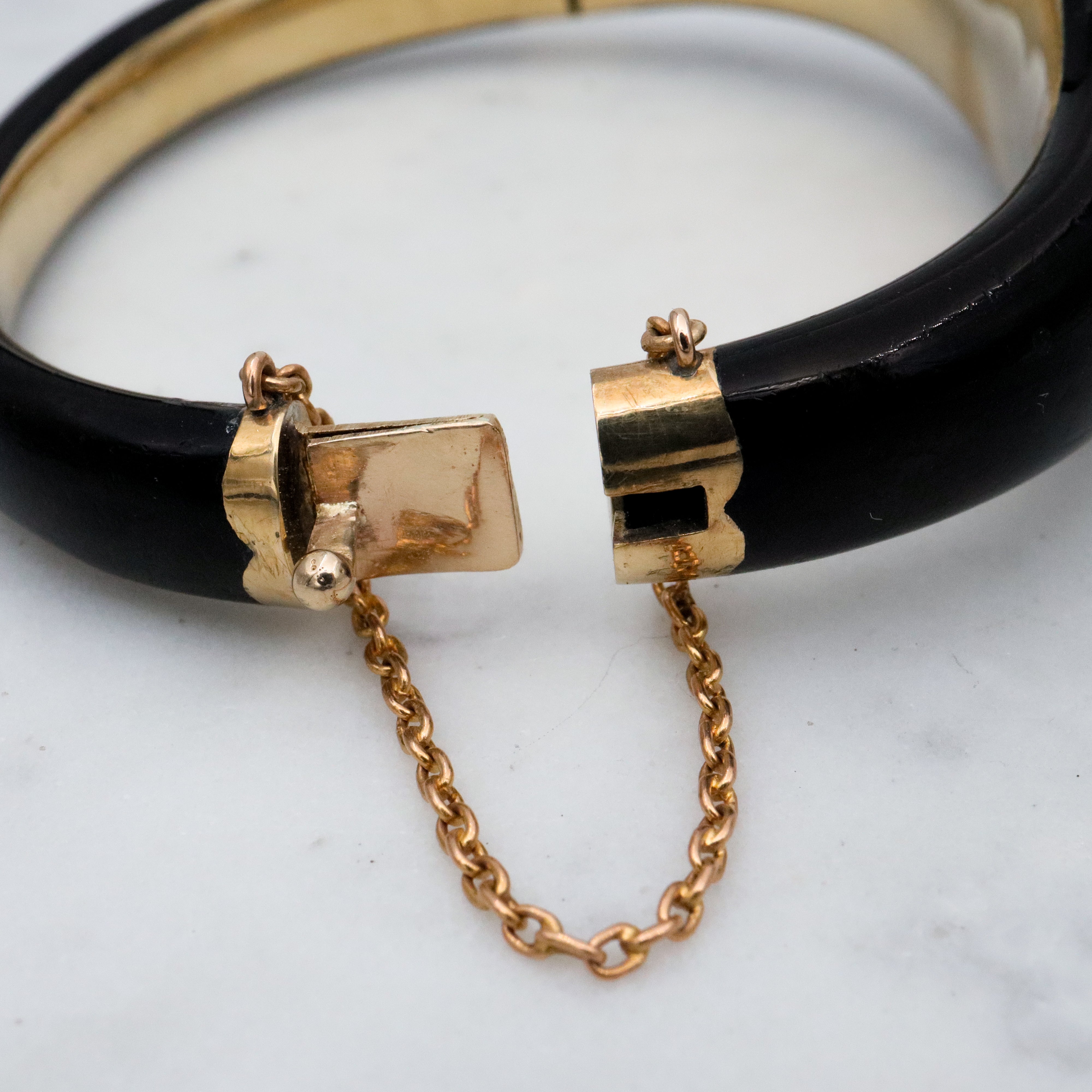 Antique Victorian 14k gold black enamel mourning bangle with rose cut diamonds