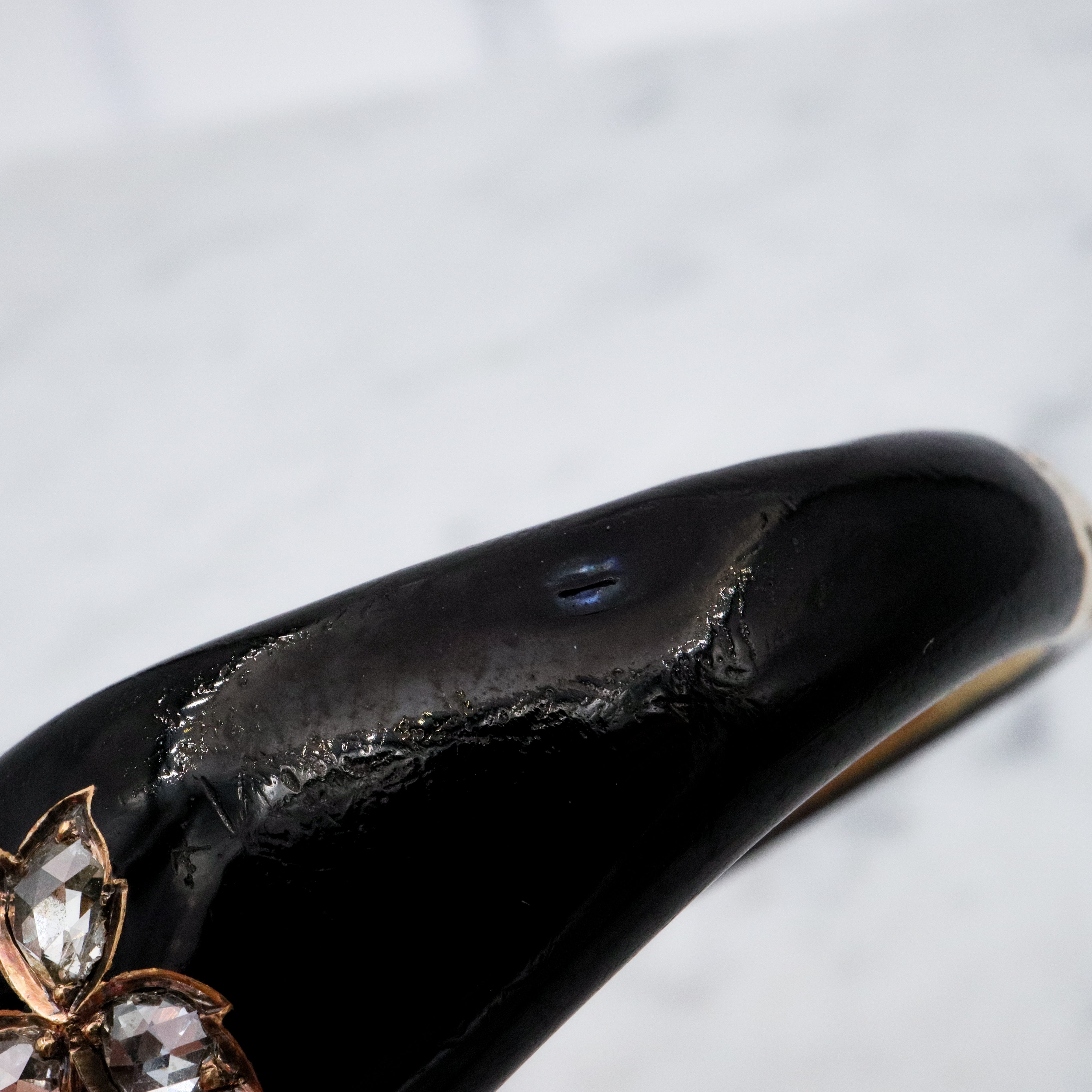 Antique Victorian 14k gold black enamel mourning bangle with rose cut diamonds