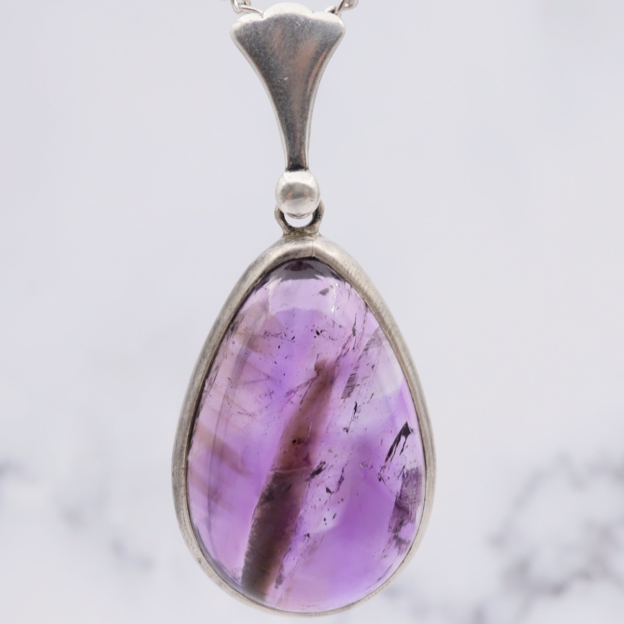 Antique sterling silver and amethyst tear drop pendant