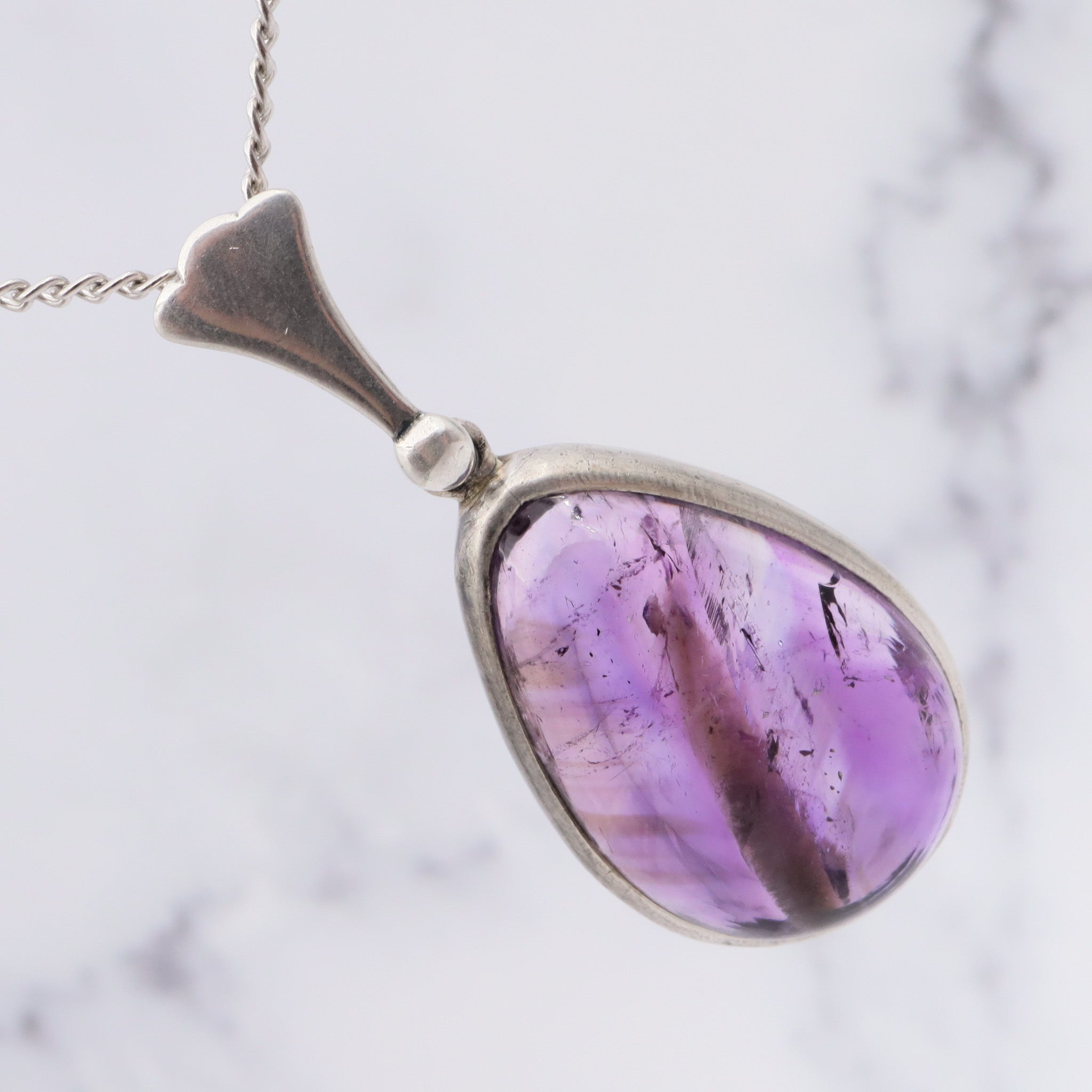 Antique sterling silver and amethyst tear drop pendant