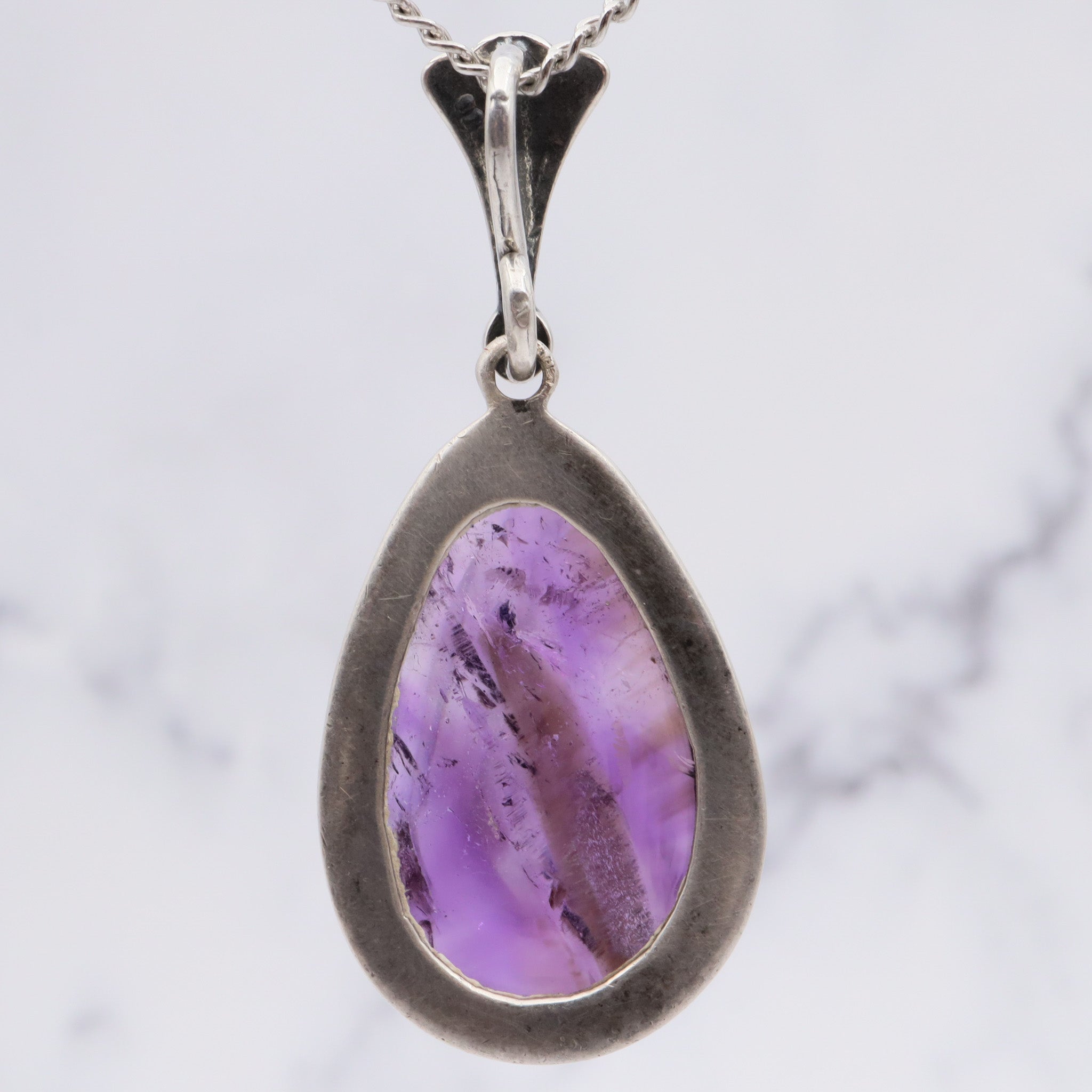 Antique sterling silver and amethyst tear drop pendant