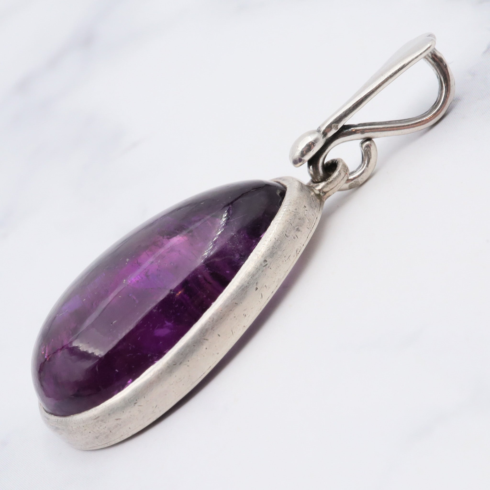 Antique sterling silver and amethyst tear drop pendant