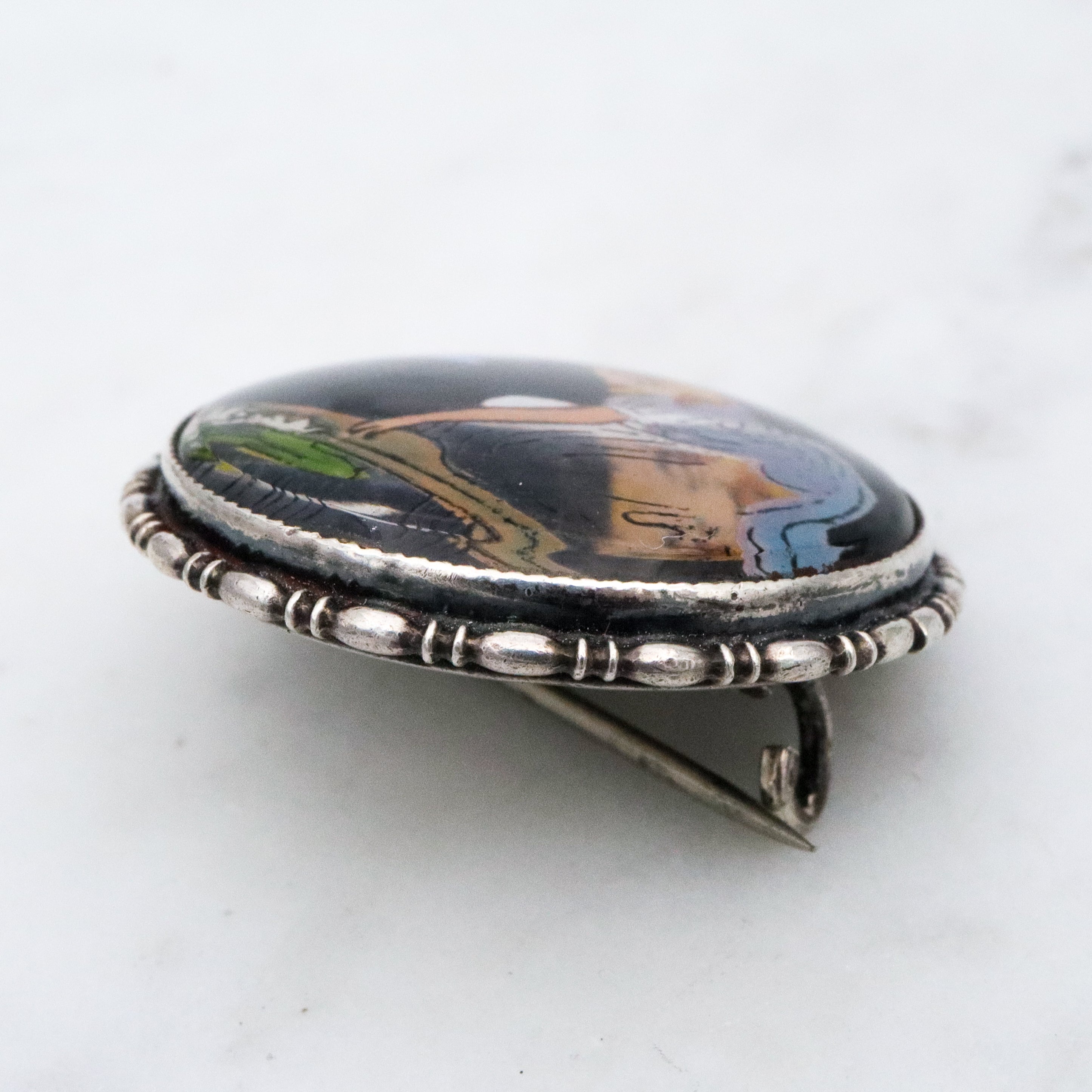 Antique Victorian 1924 England sterling morpho butterfly reverse painted brooch