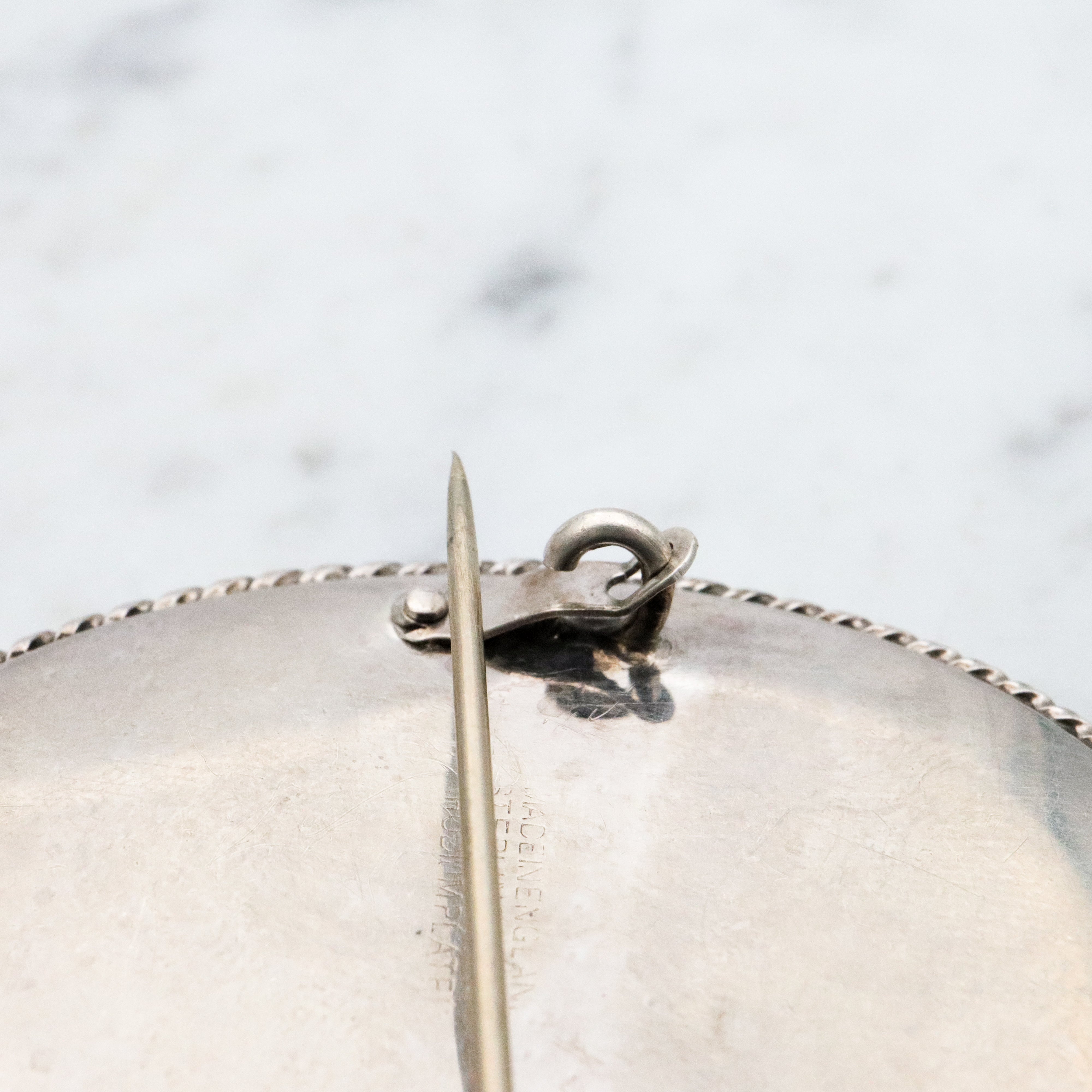 Antique sterling brooch with portrait of 