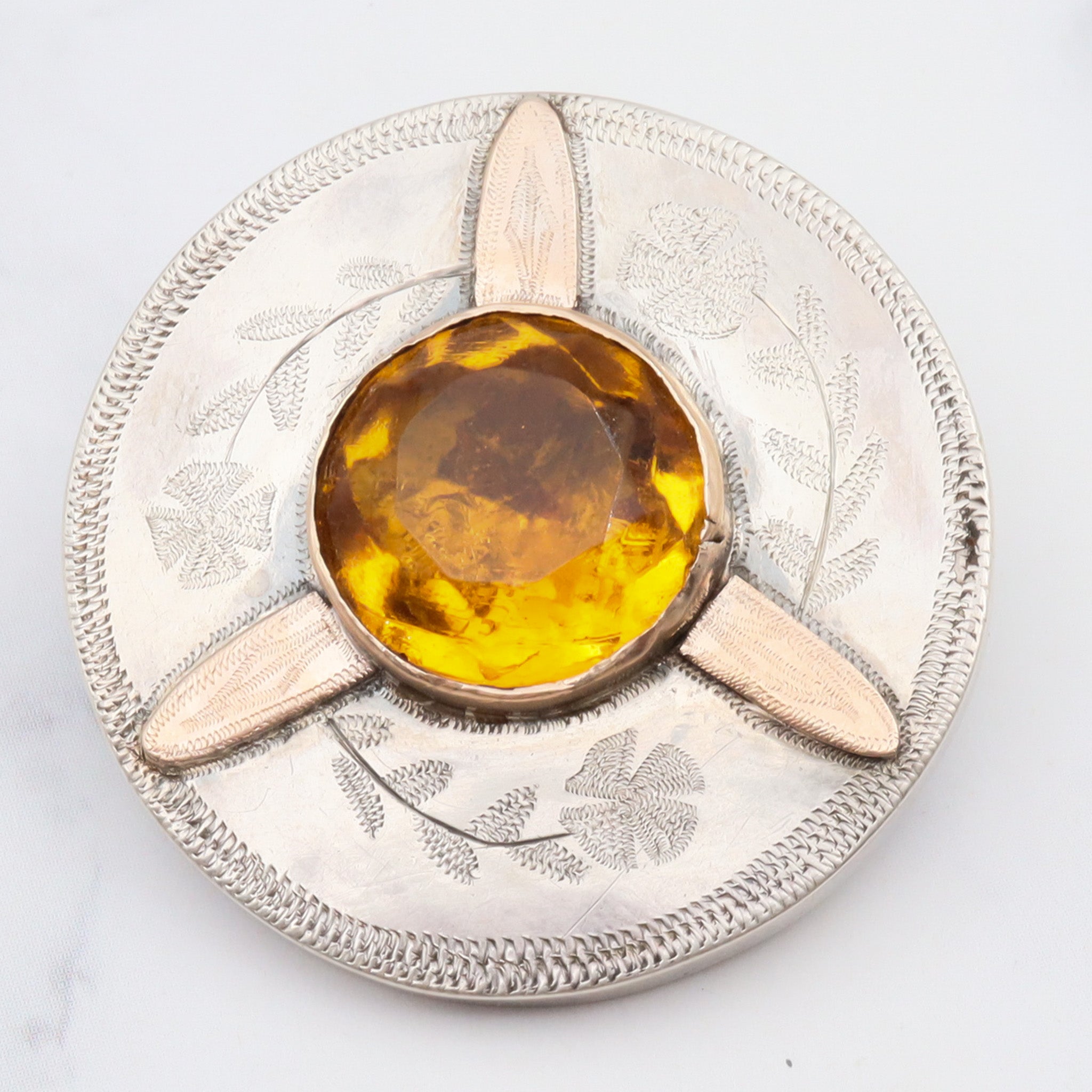 Antique victorian hand engraved sterling silver brooch with gold accents and citrine glass