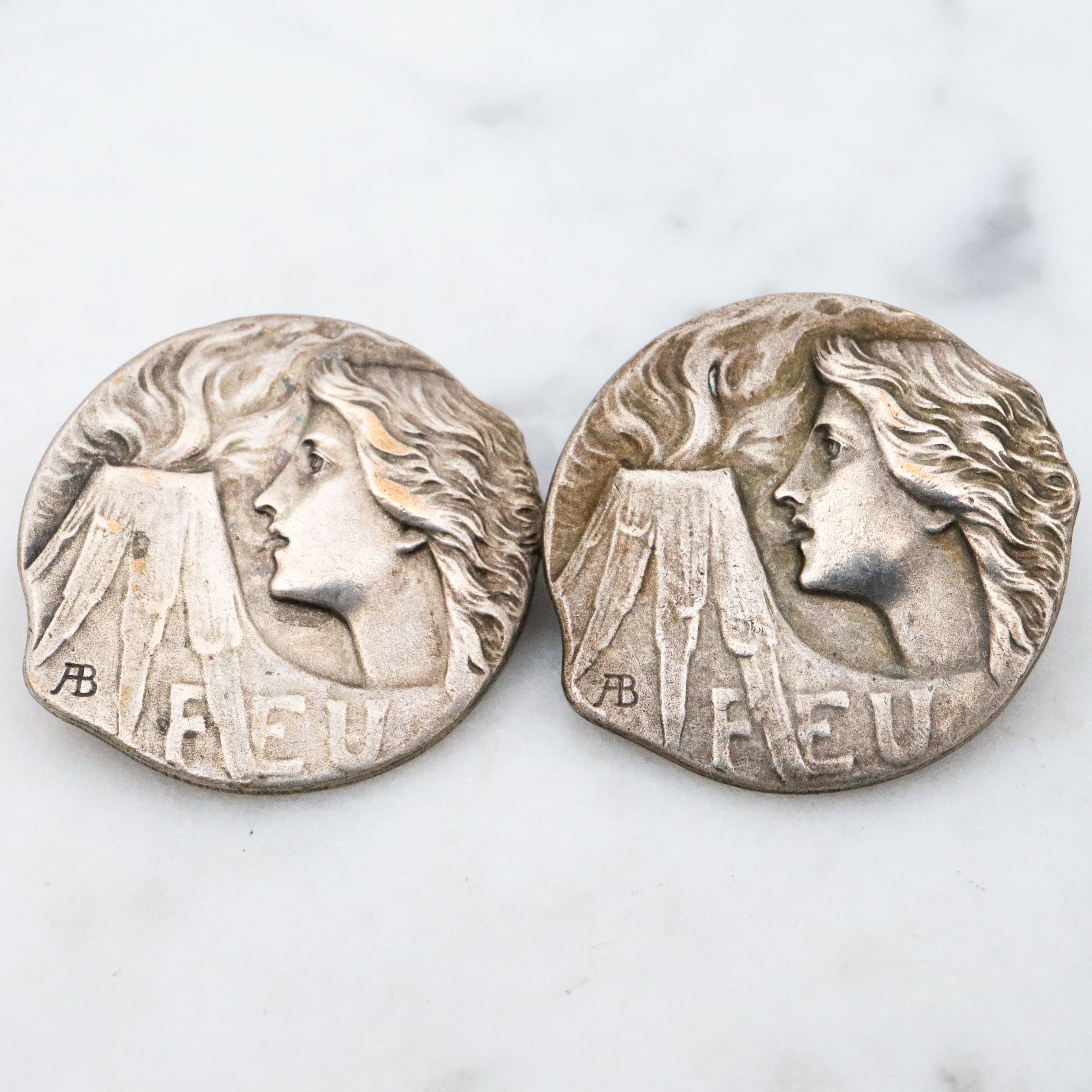 Group of 4 Antique Art Nouveau Armand Bargas Earth & Fire silver plated buttons