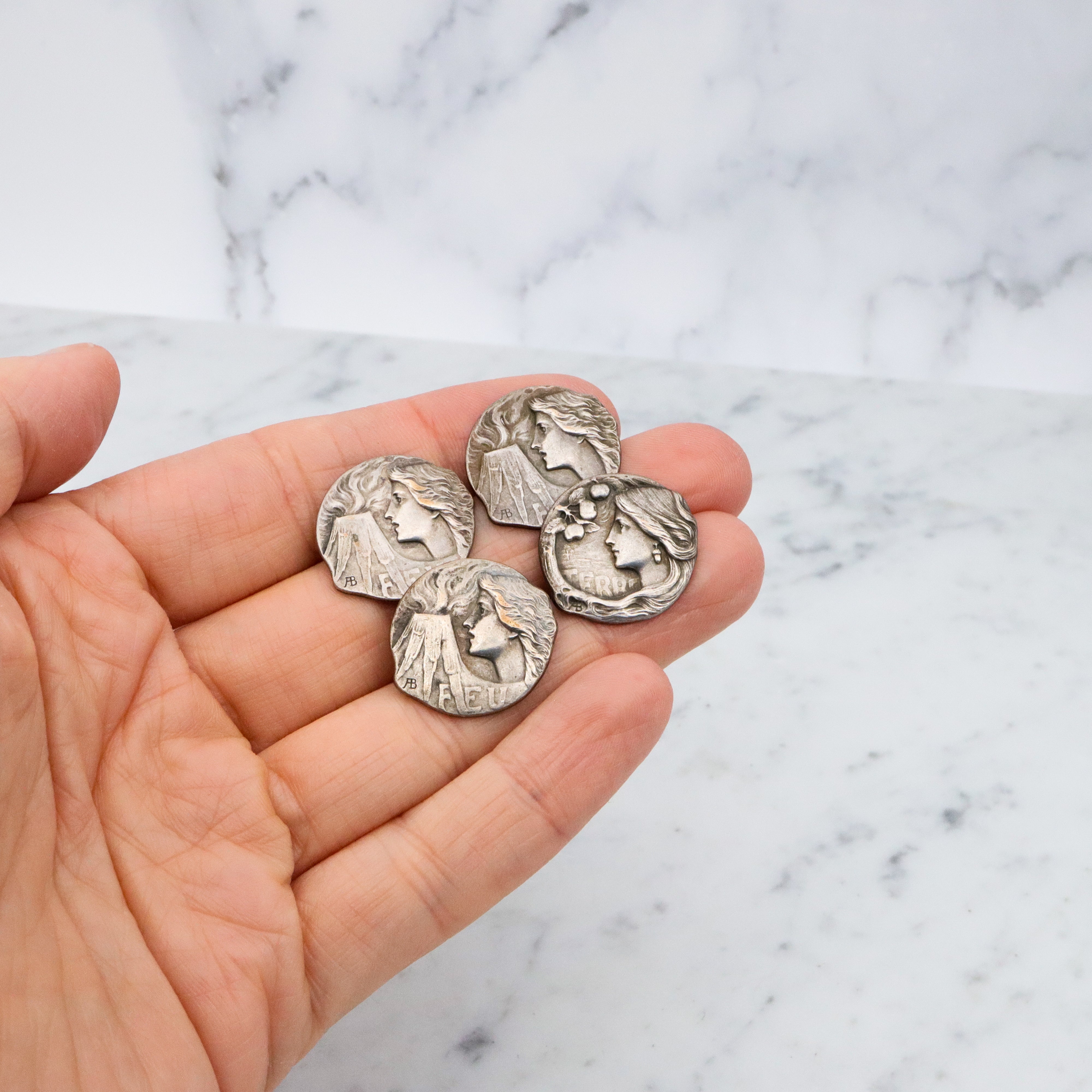 Group of 4 Antique Art Nouveau Armand Bargas Earth & Fire silver plated buttons