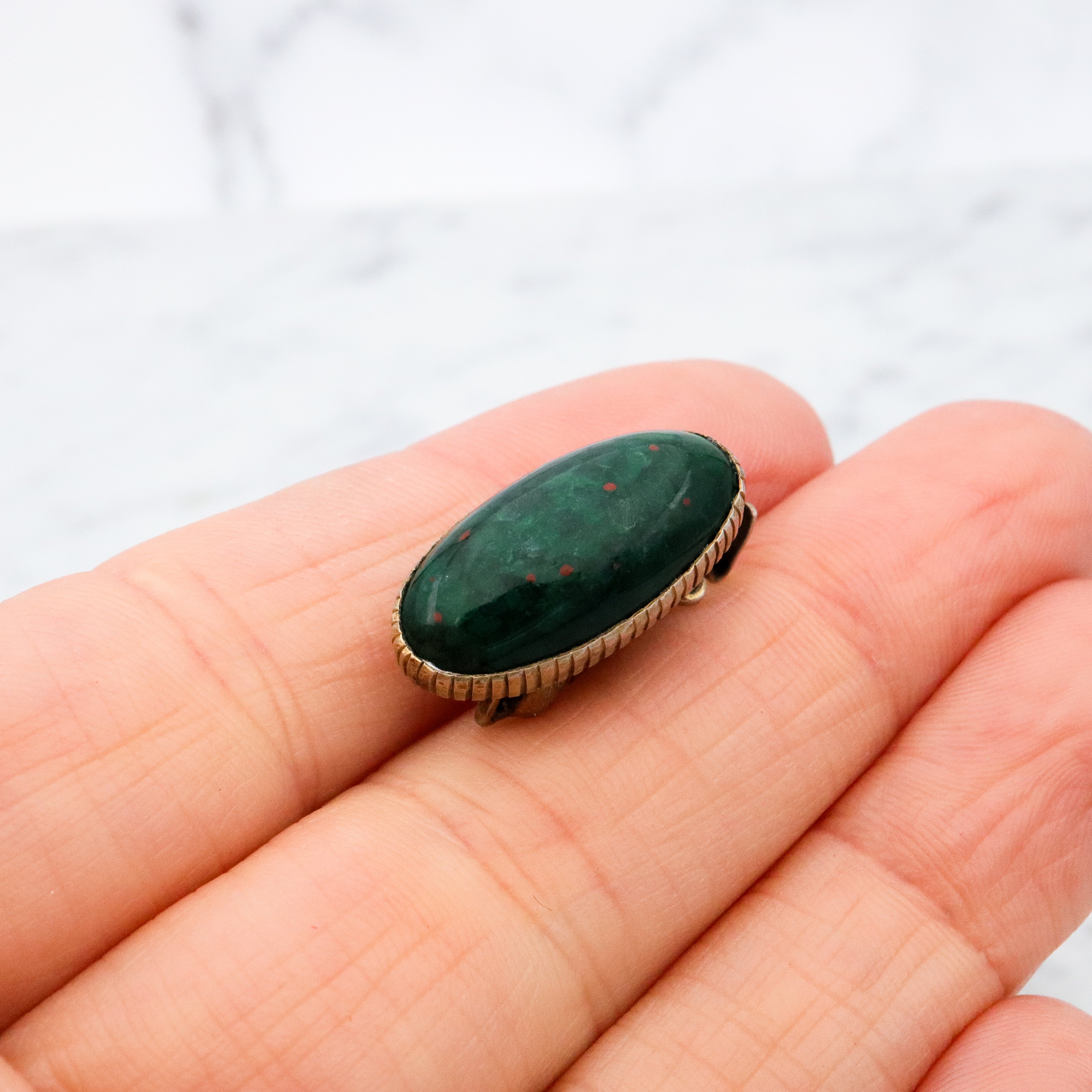 Antique gilt sterling figural matador & bull fob pendant w/faux bloodstone bottom